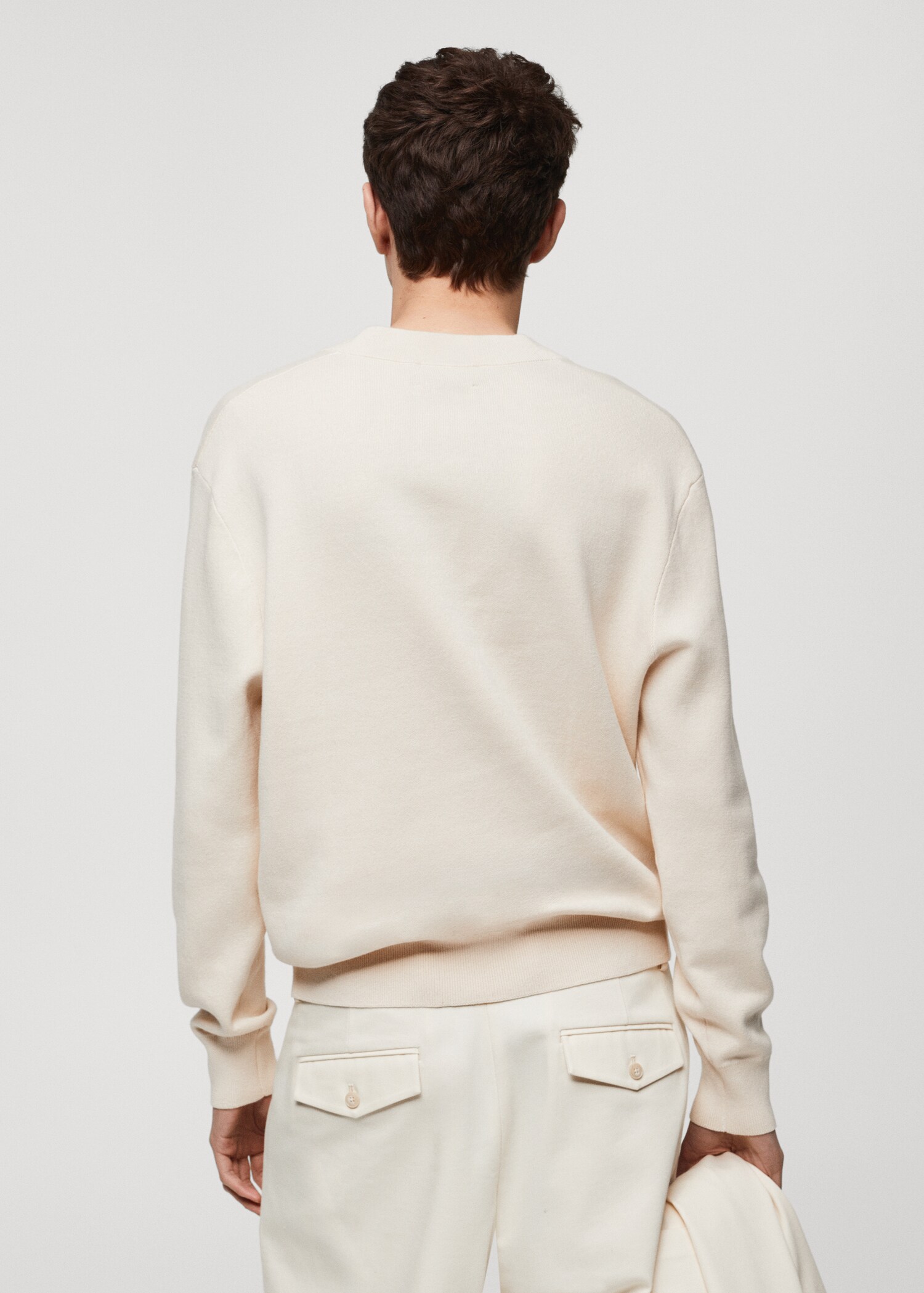 Strickpullover mit V-Ausschnitt - Rückseite des Artikels