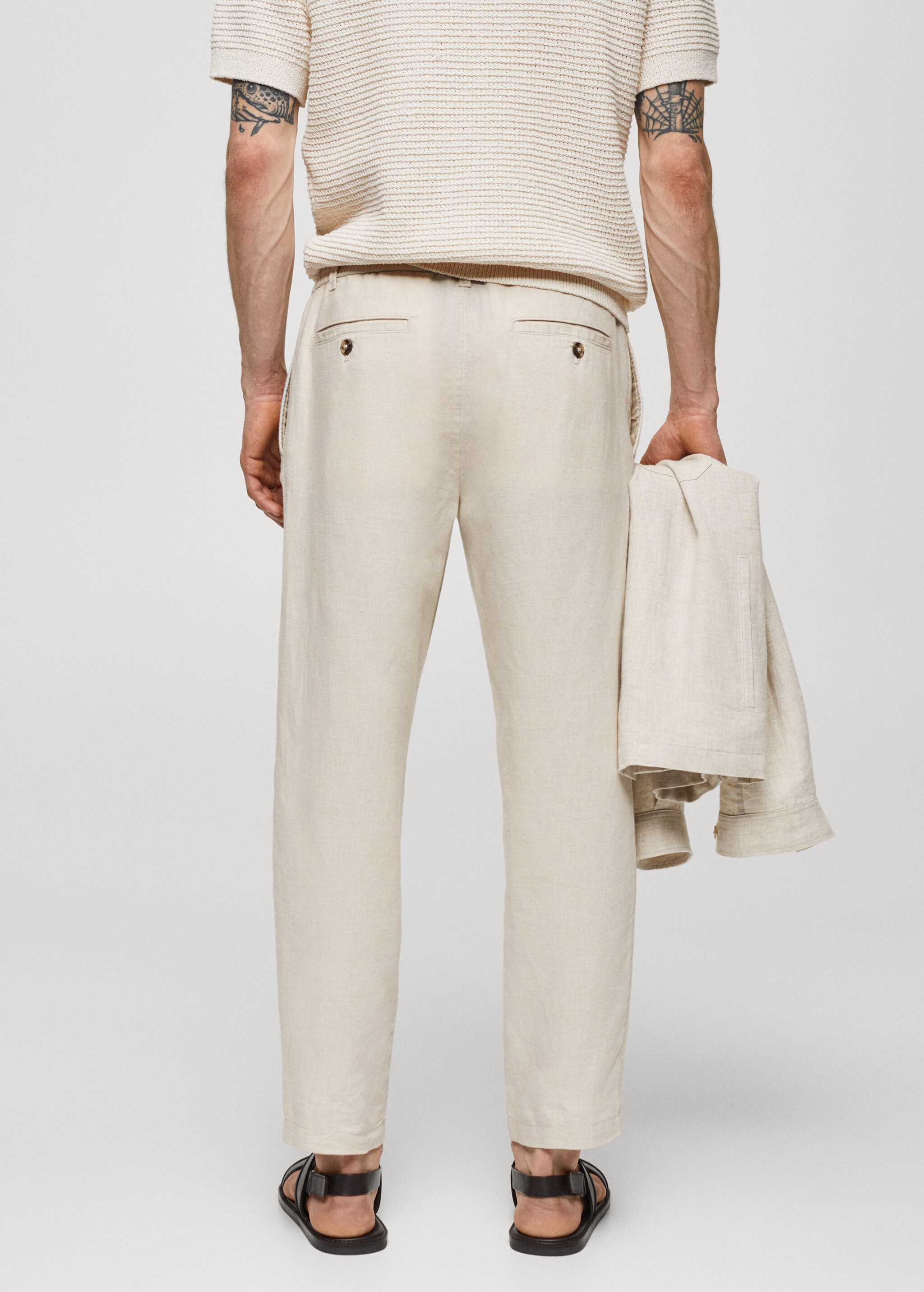 Льняные брюки slim fit со шнурком - Обратная сторона изделия