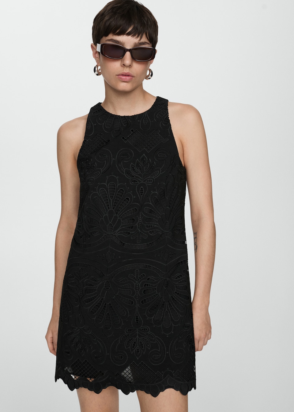 Mango b lack embroidered detail mini dress with wide straps and scalloped hem.
