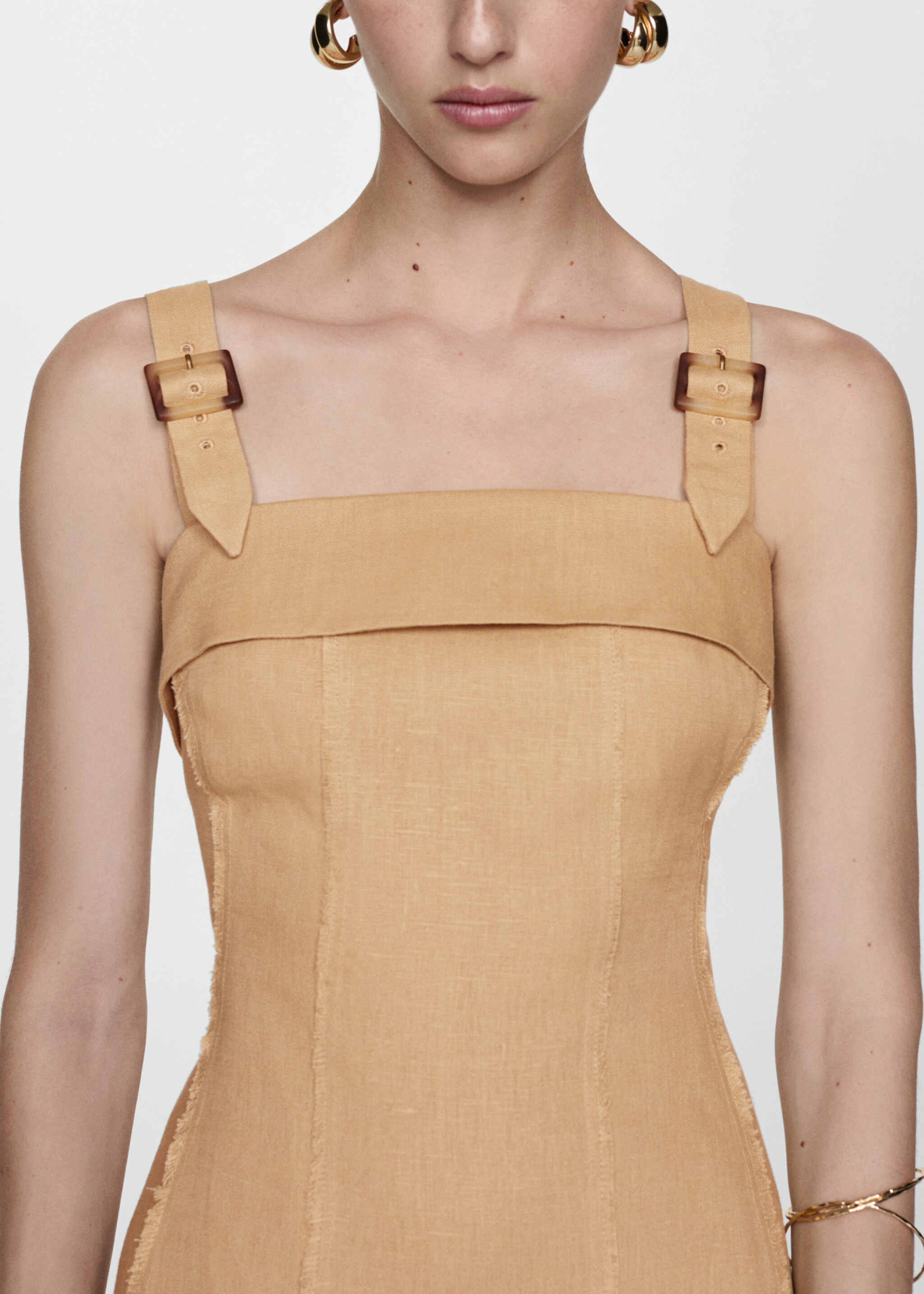 Linen dress with buckle straps - Details of the article 6, Sand. Ref: 67038647-00.