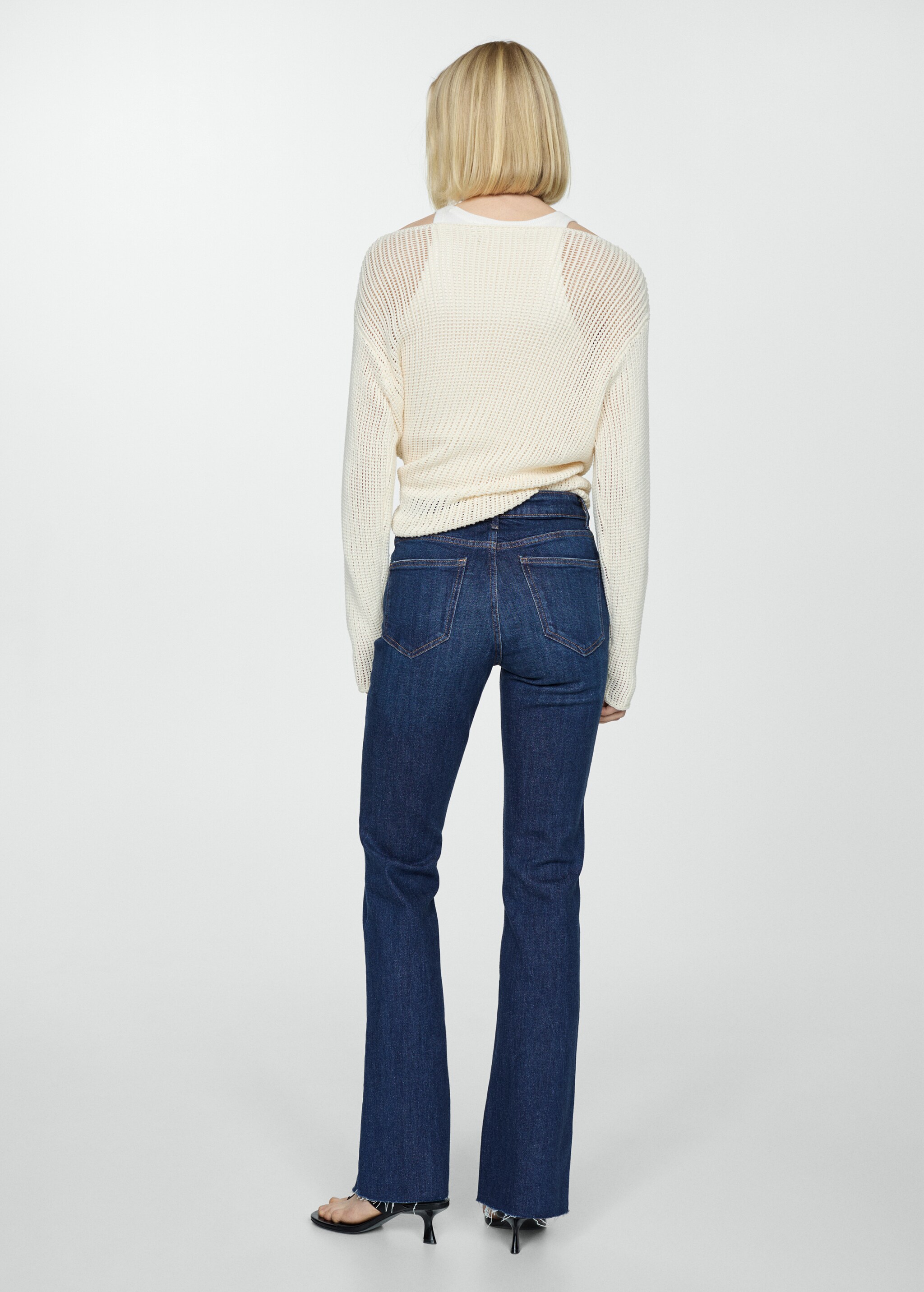 Medium-rise flared jeans  - Reverse of the article