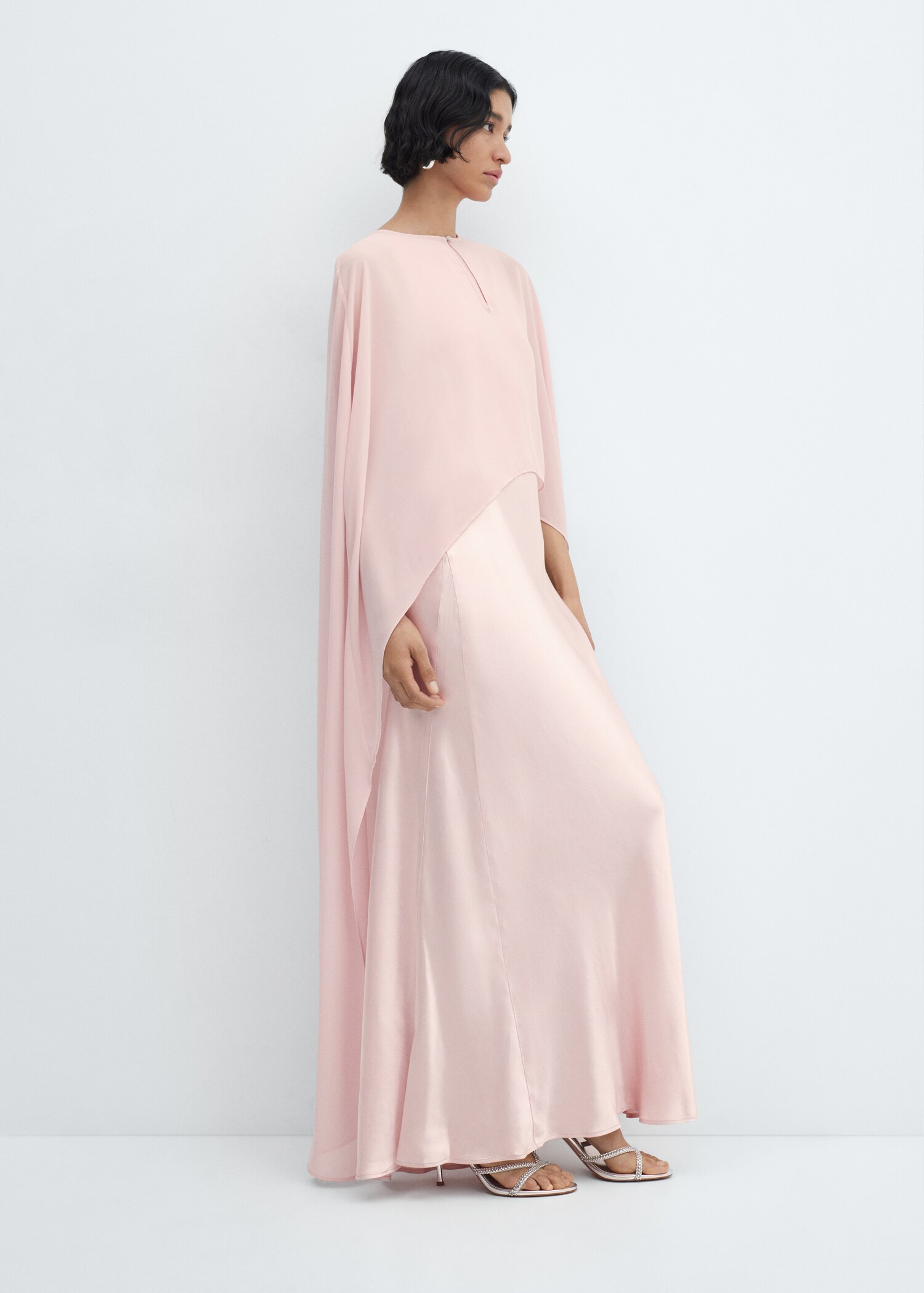 Asymmetric semi-transparent cape - Details of the article 2