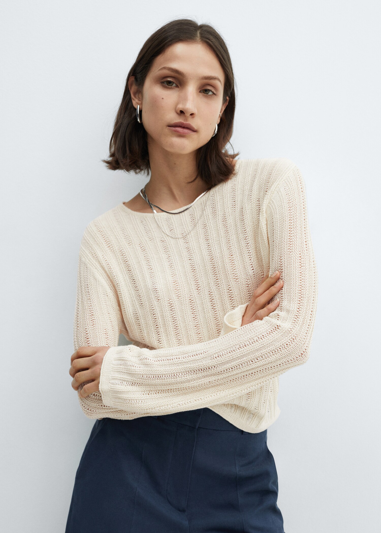 Unstitched sweater with flared sleeve - Woman | MANGO USA