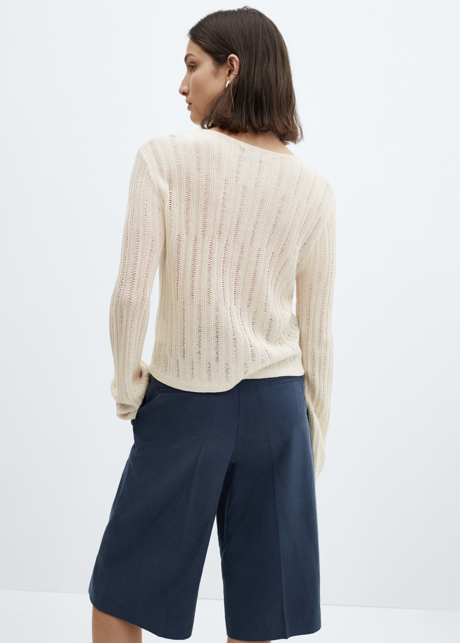 Unstitched sweater with flared sleeve - Woman | MANGO USA