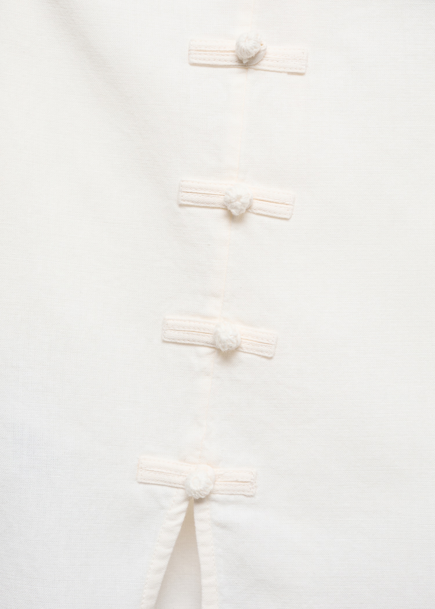Mini-skirt with decorative buttons - Details of the article 8