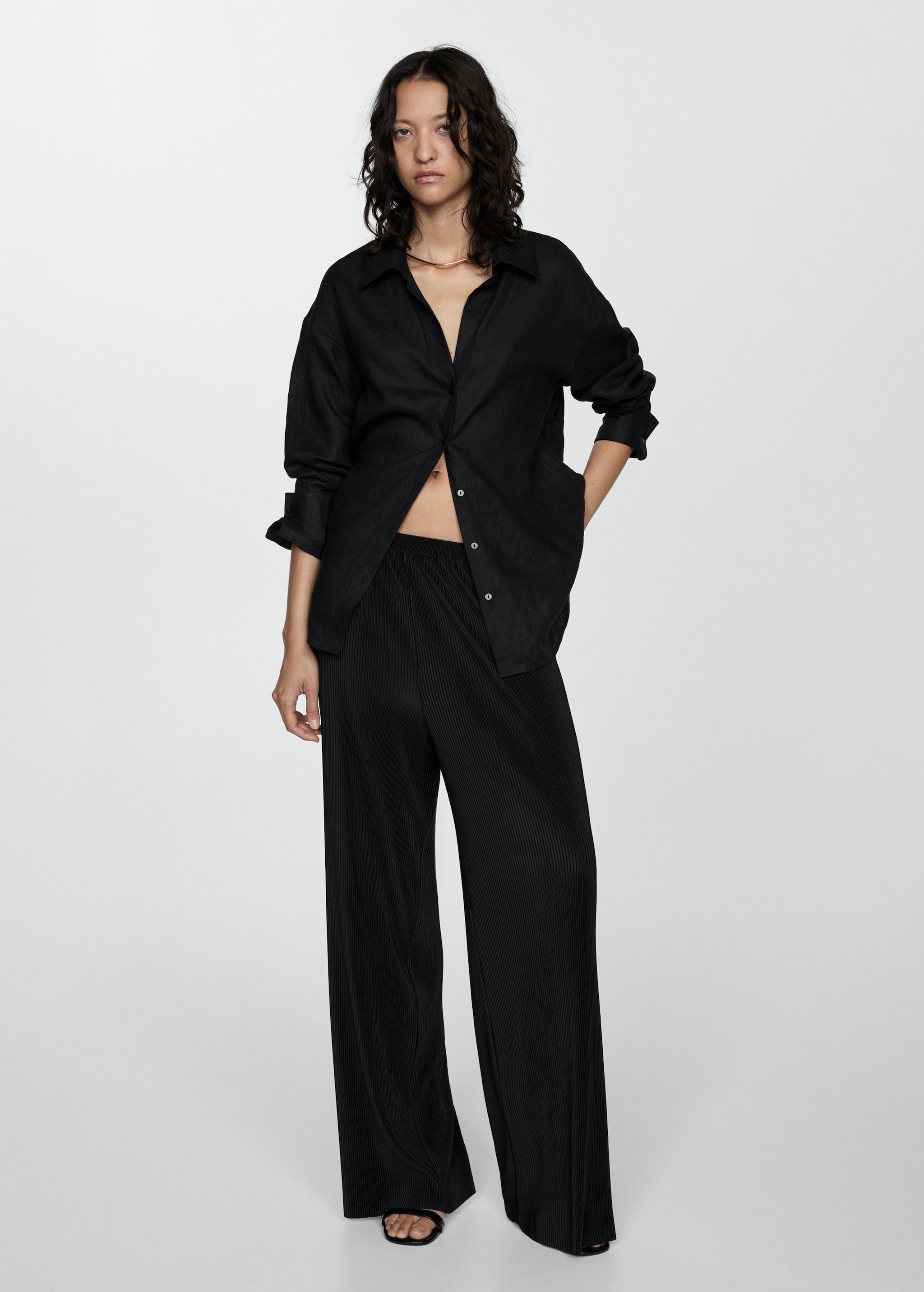 Pleated palazzo trousers - Details of the article 1