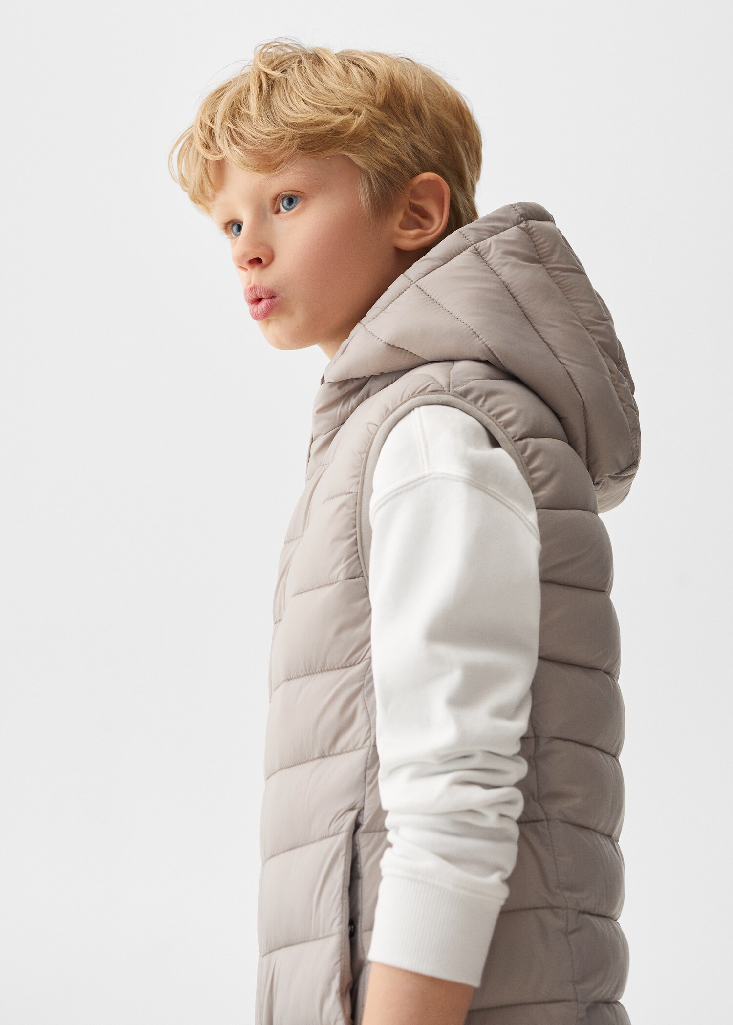 Quilted gilet with hood - Details of the article 1