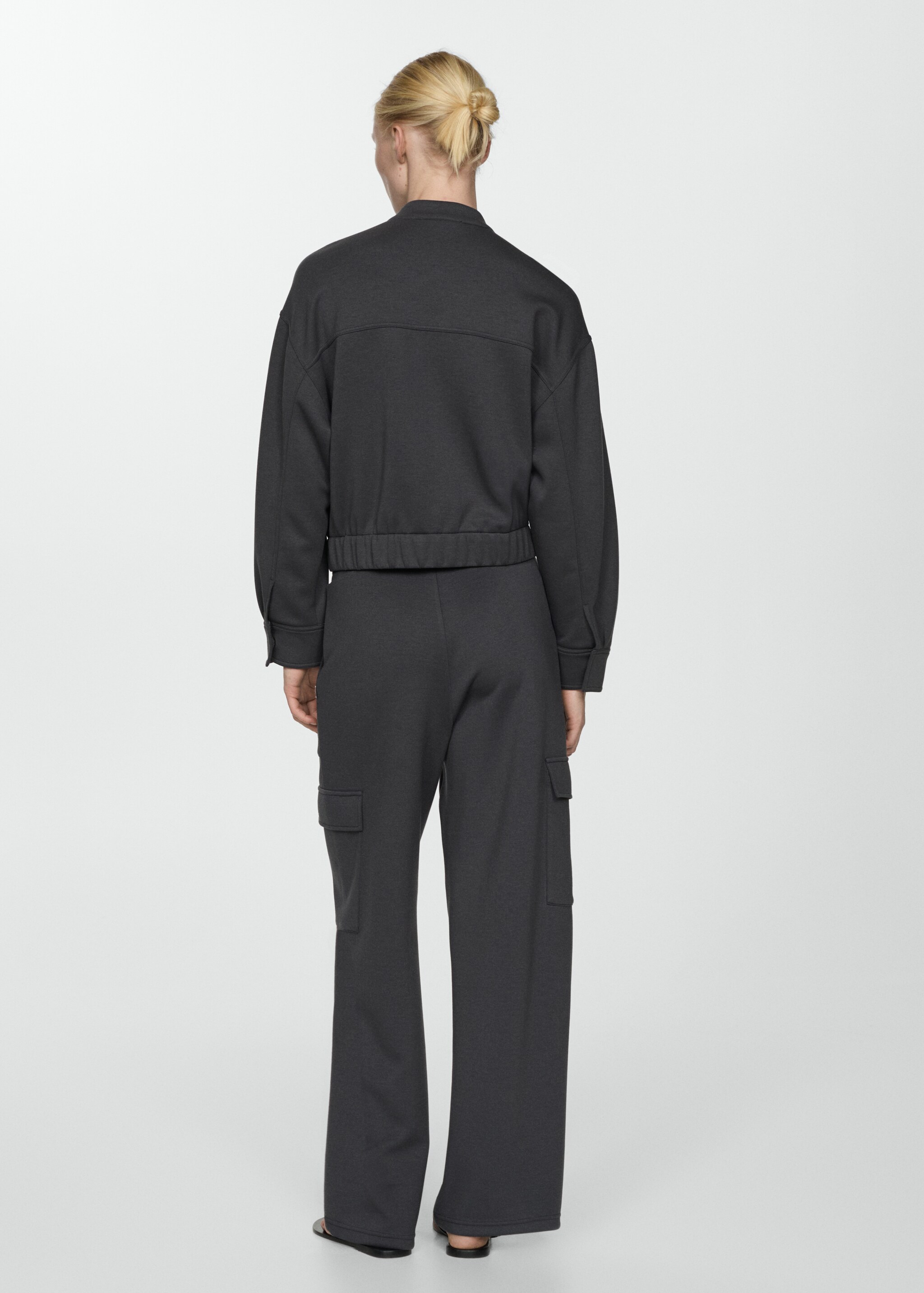 Elastic waist cargo trousers - Reverse of the article