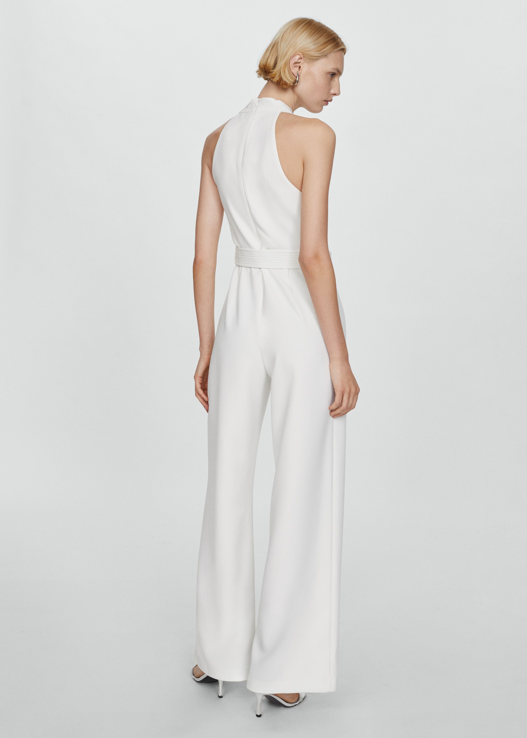 Belted crossover collar jumpsuit - Reverse of the article