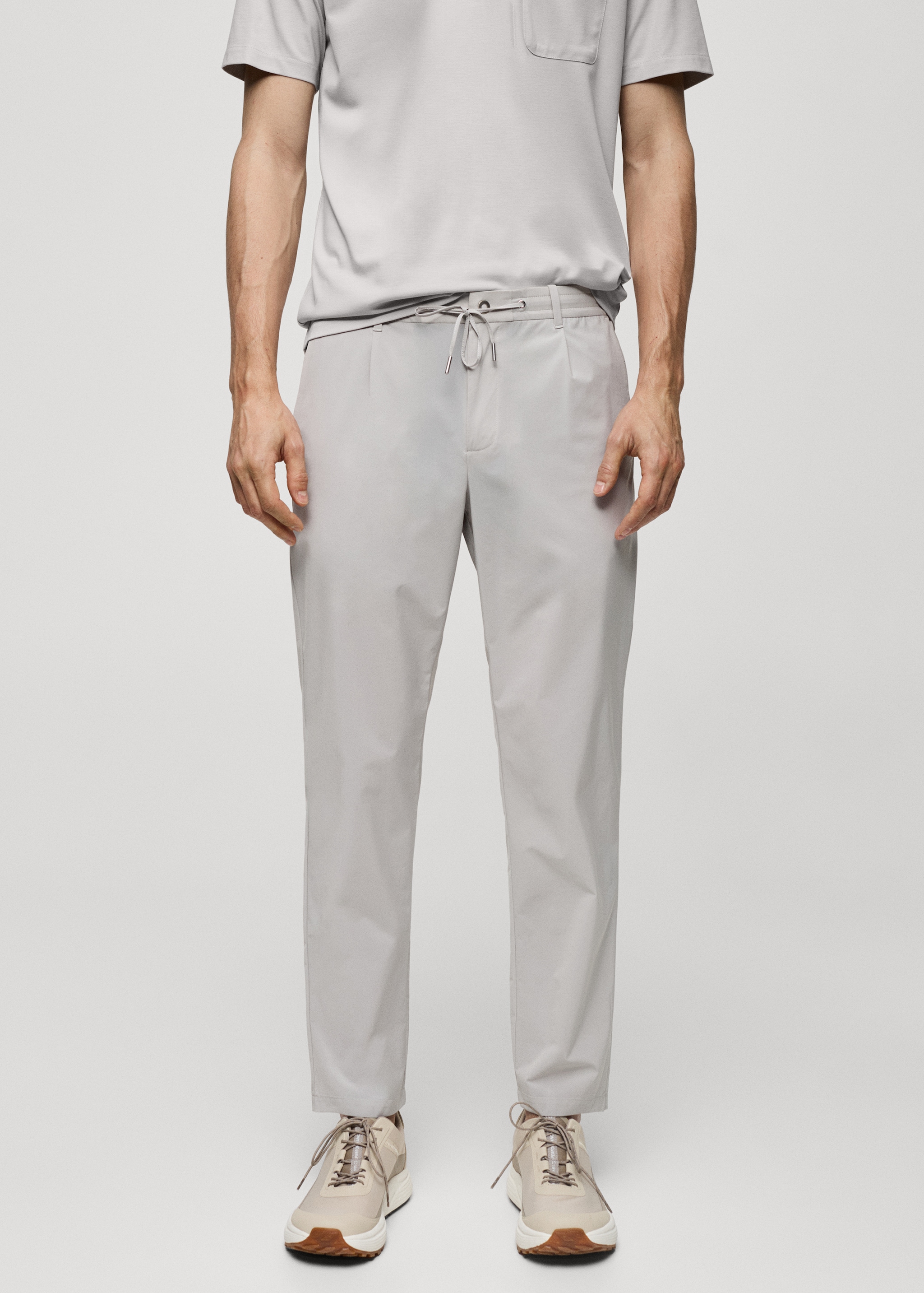 Water-repellent trousers with drawstring - Medium plane