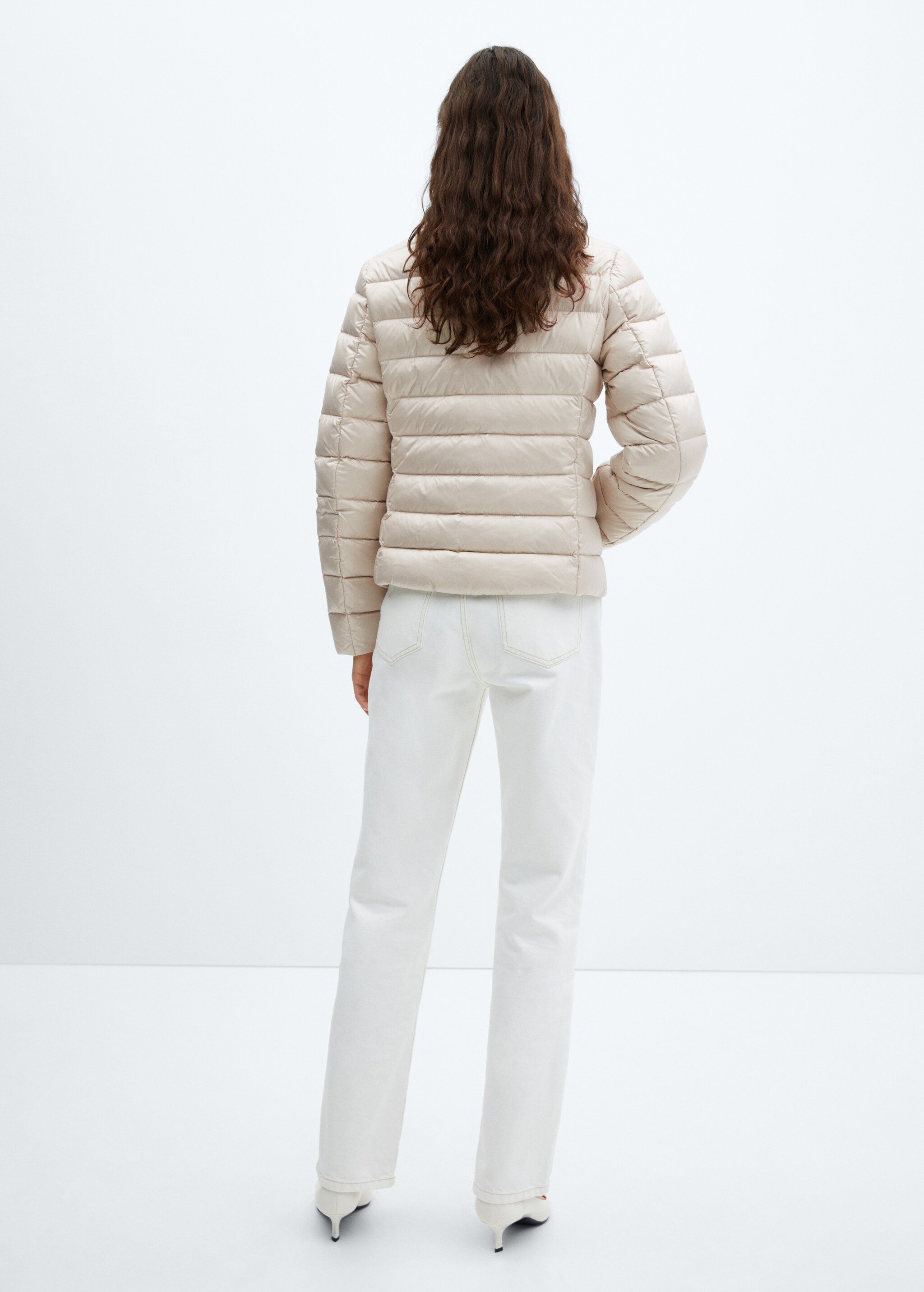 Quilted feather coat - Reverse of the article