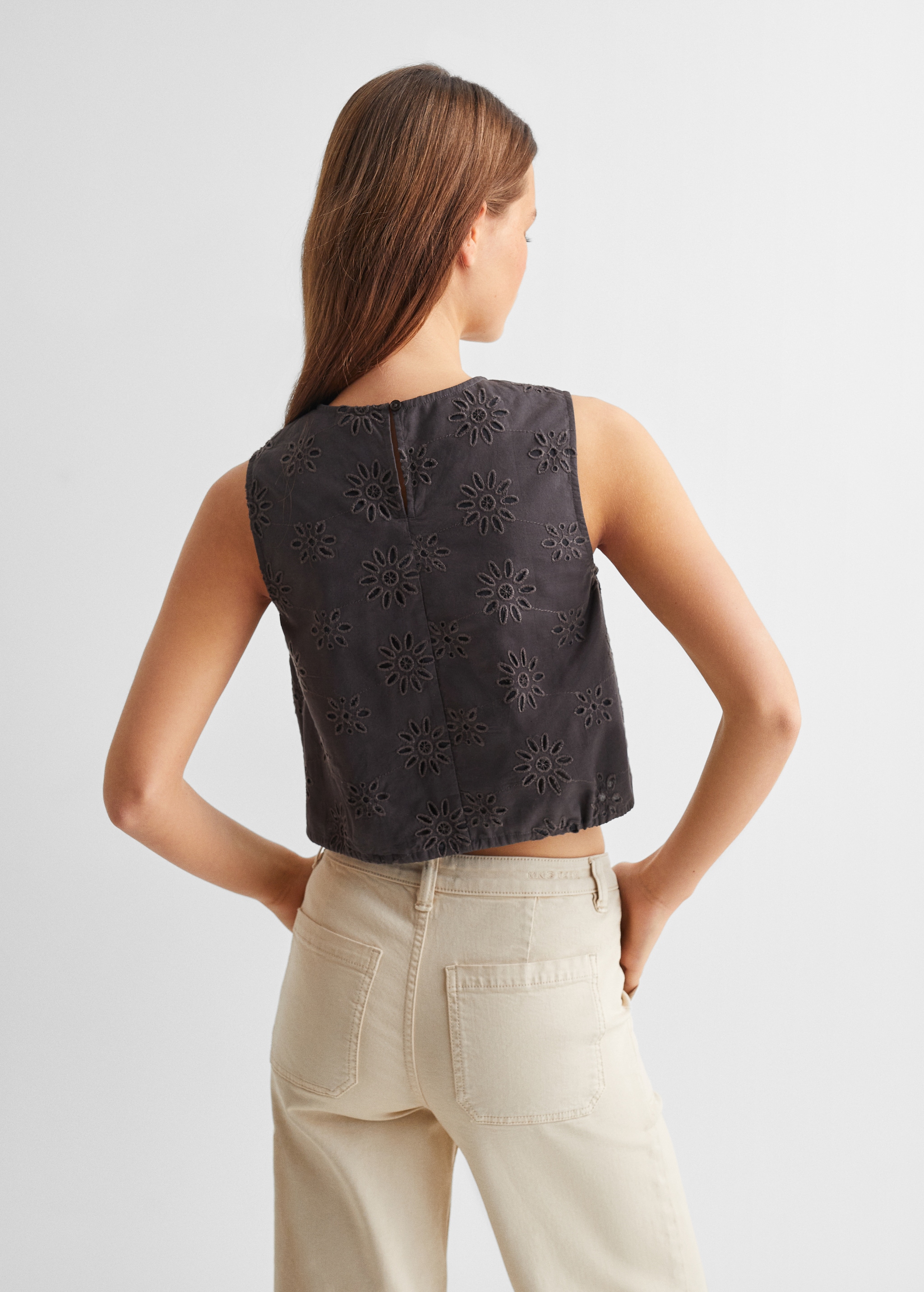 Embroidered top with bow - Reverse of the article
