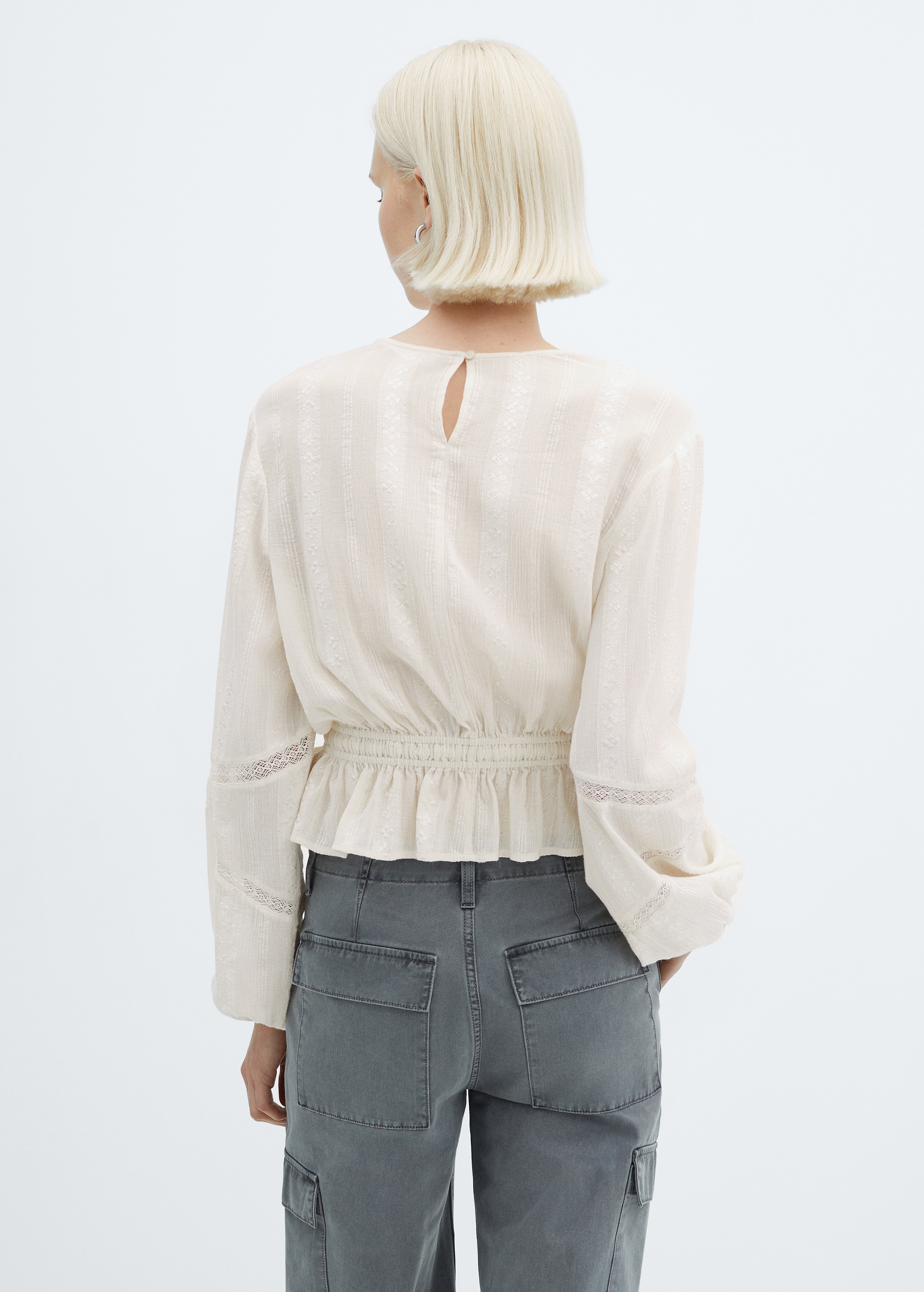 Embroidered puff-sleeve blouse - Reverse of the article