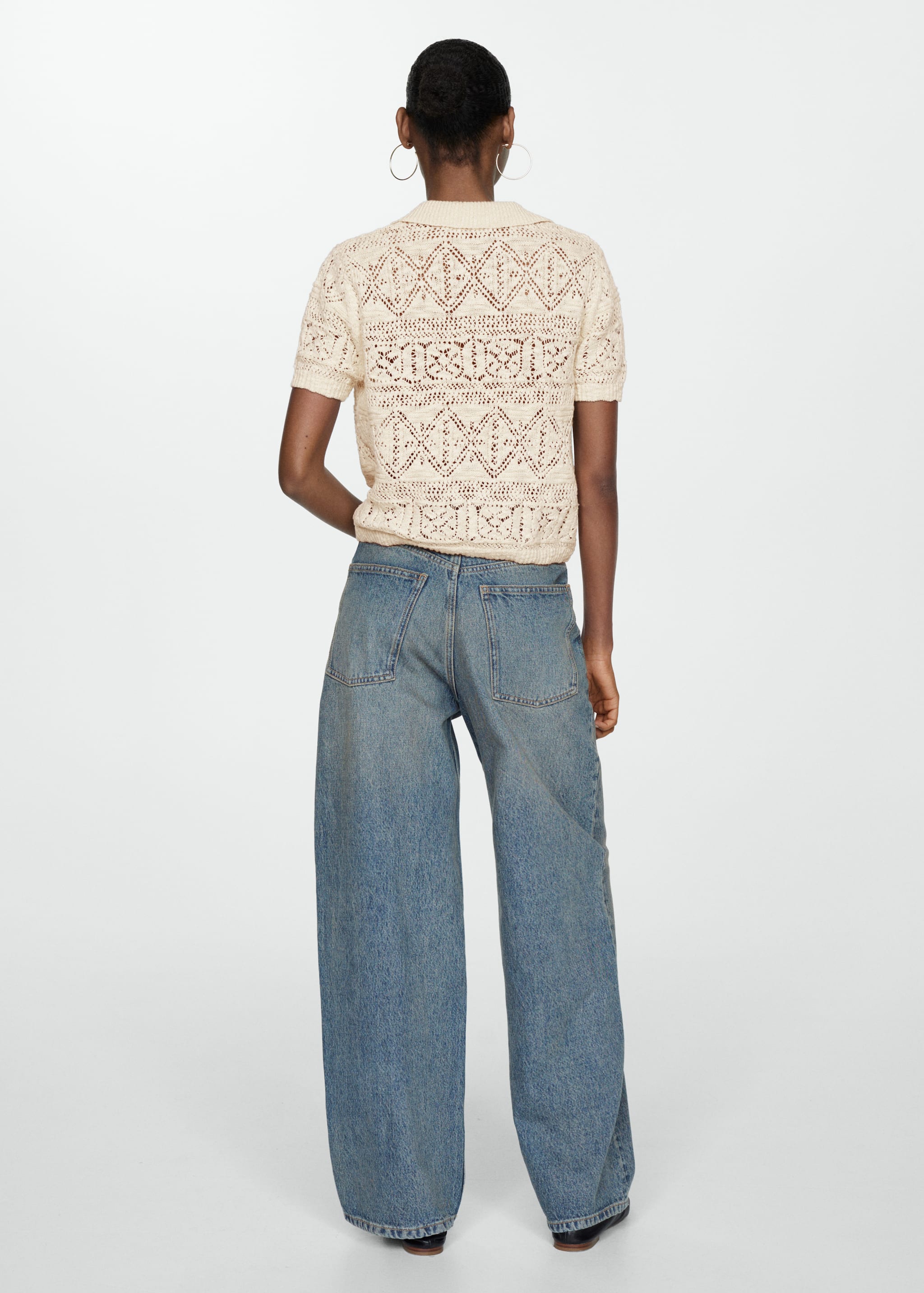 Knitted sweater with openwork details - Reverse of the article