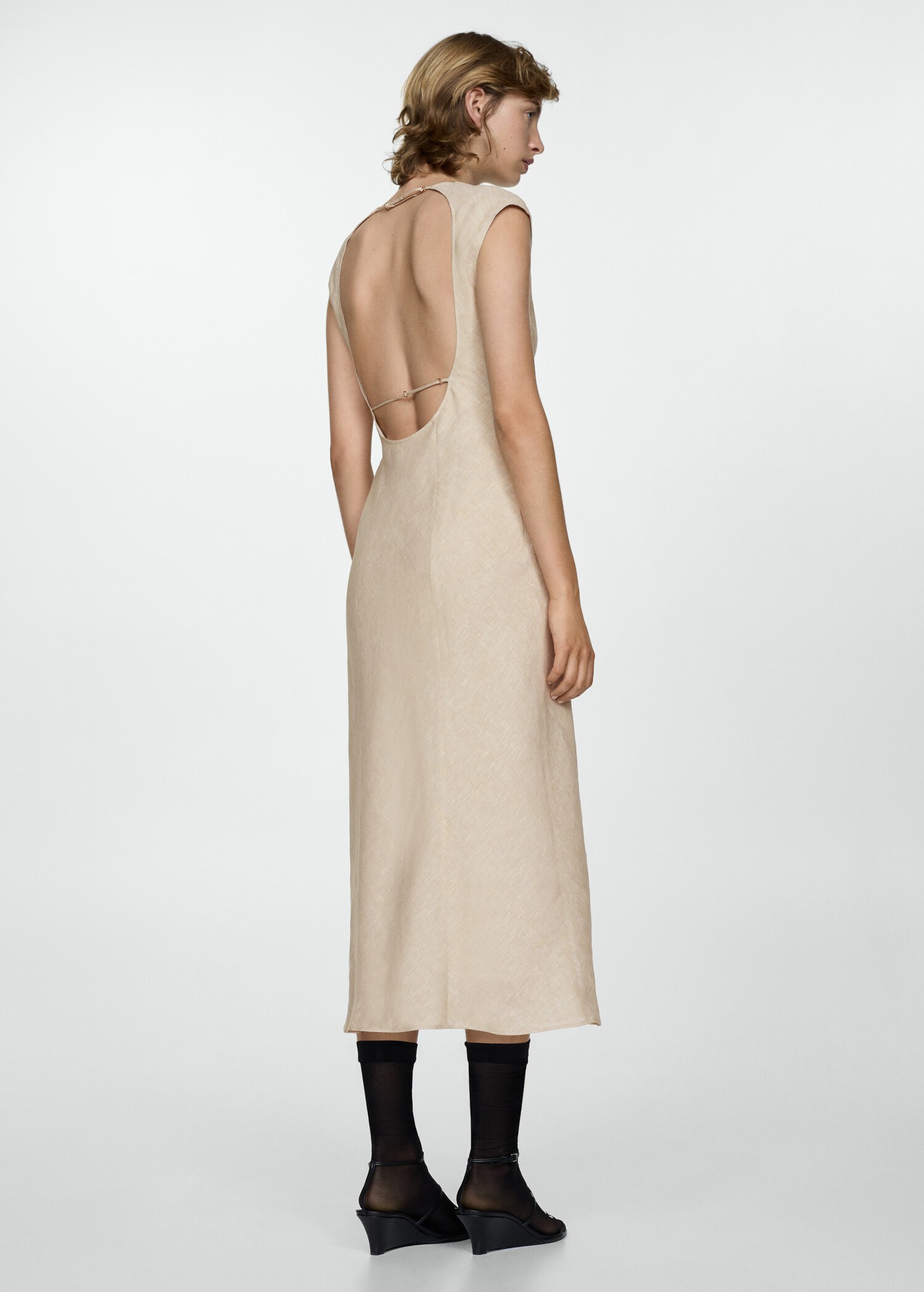 Open-back linen dress - Reverse of the article