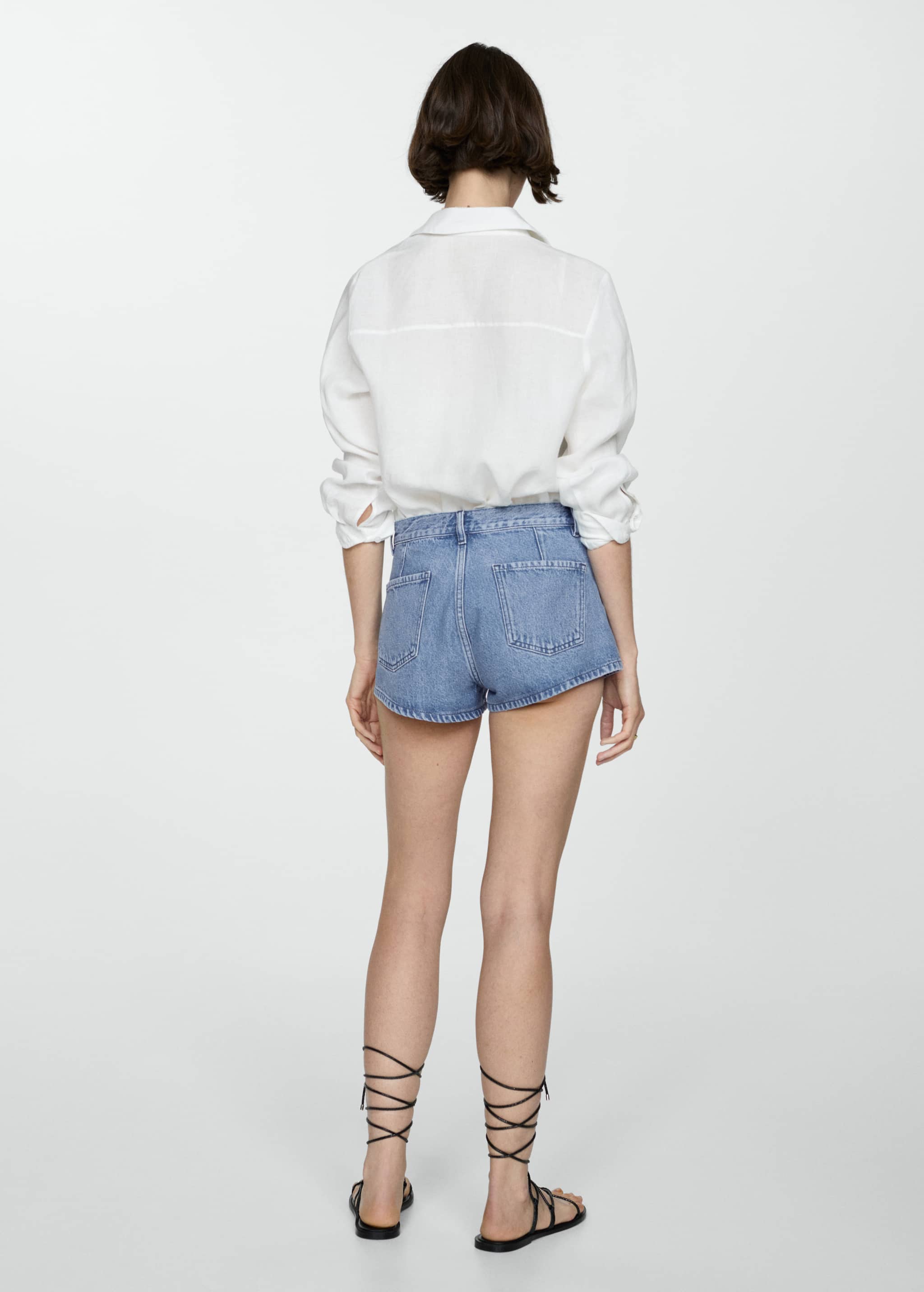 Mid-rise denim shorts - Reverse of the article