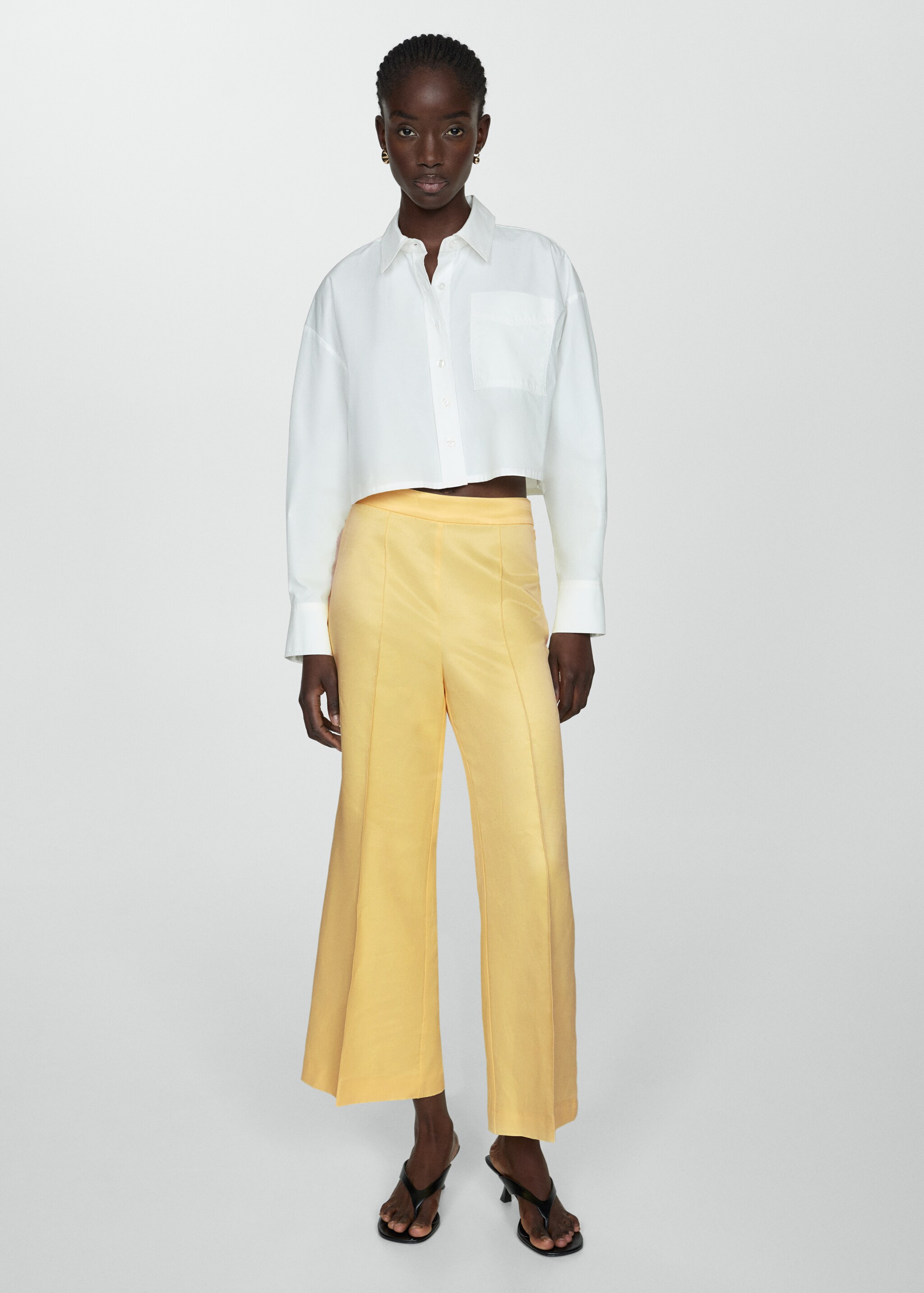 Flared trousers with pleated detail - Details of the article 2