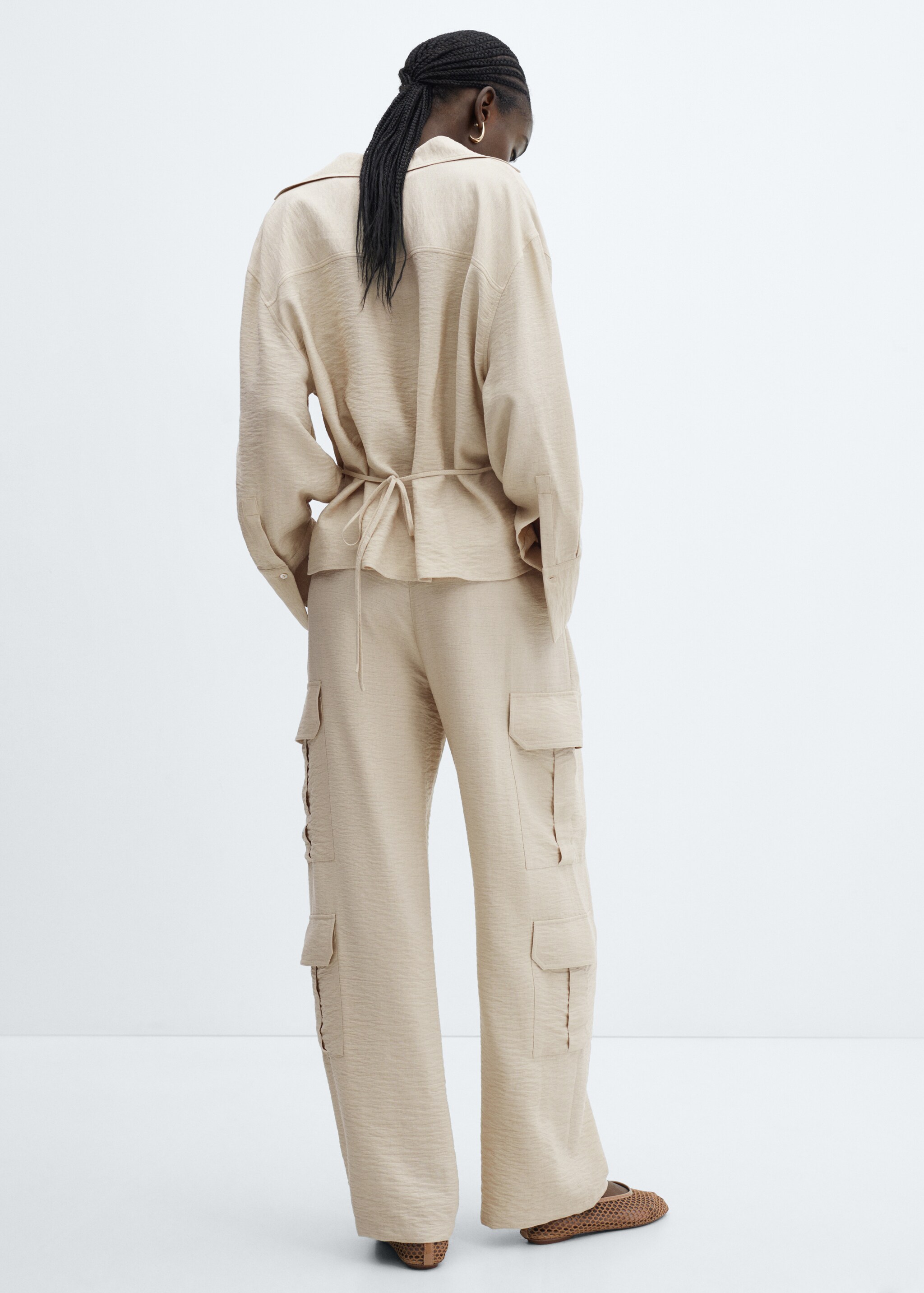 Pleated cargo pants - Reverse of the article