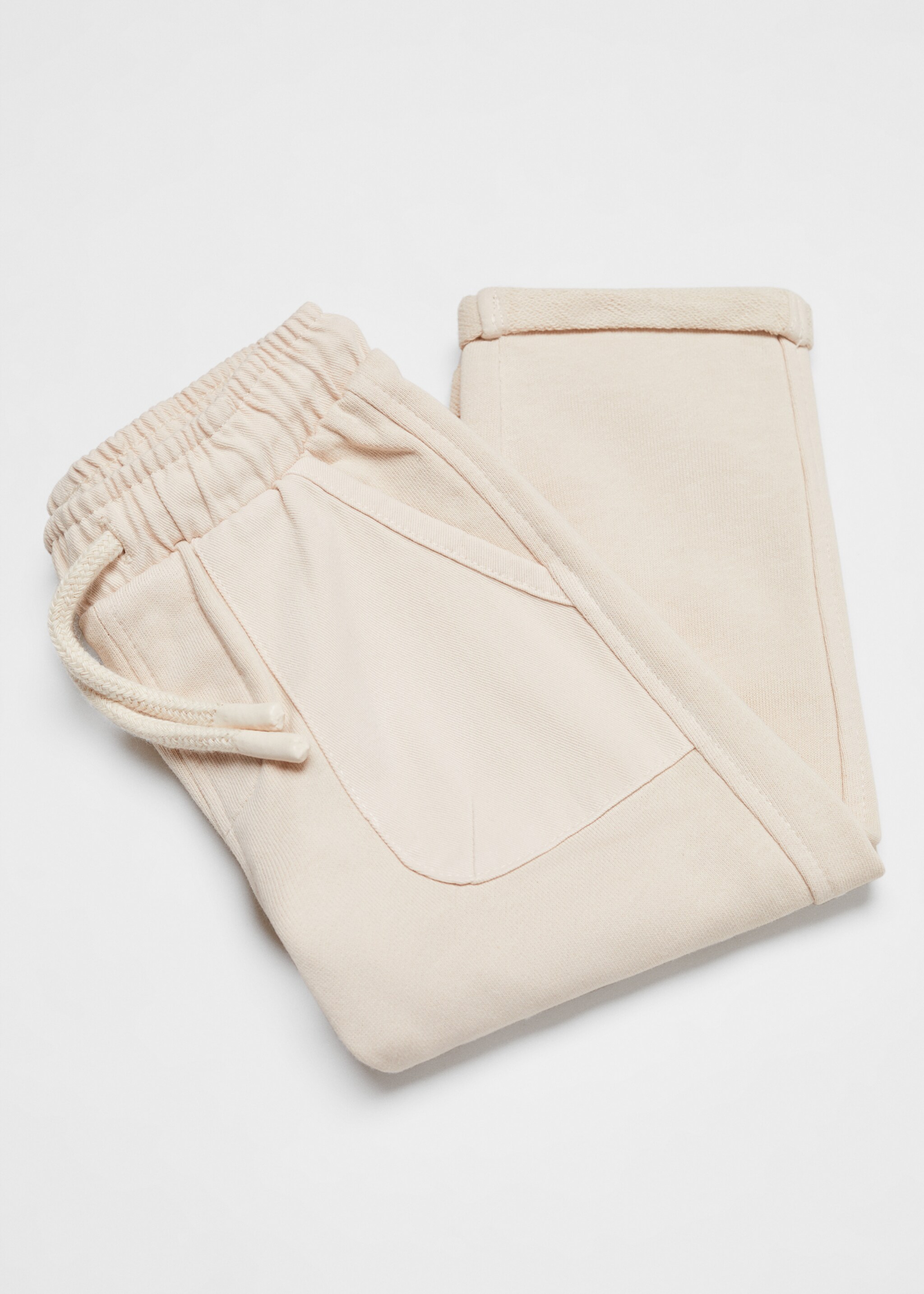 Cotton jogger-style trousers - Details of the article 0, Sand. Ref: 67076000-00.