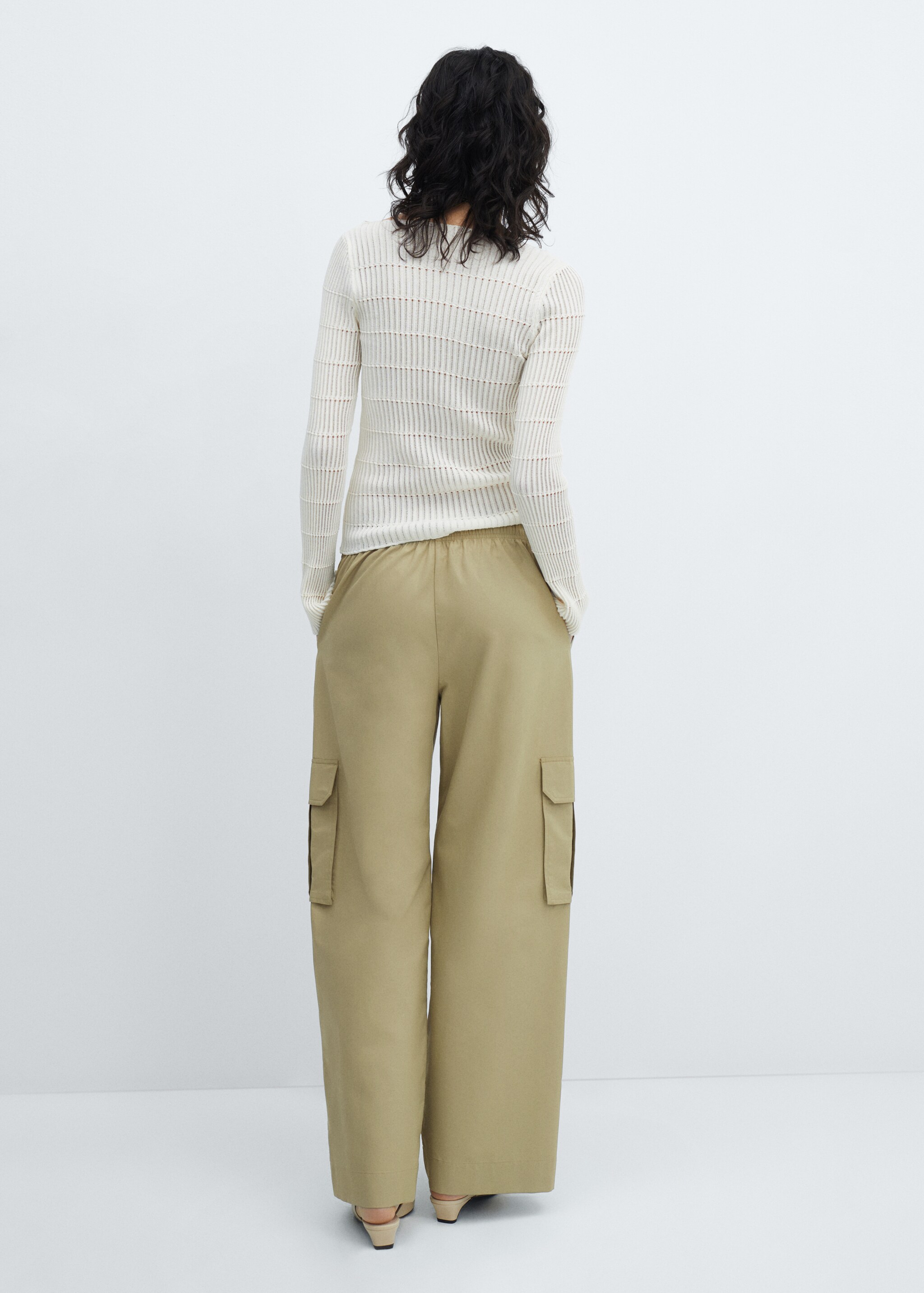 Elastic waist cargo trousers - Reverse of the article