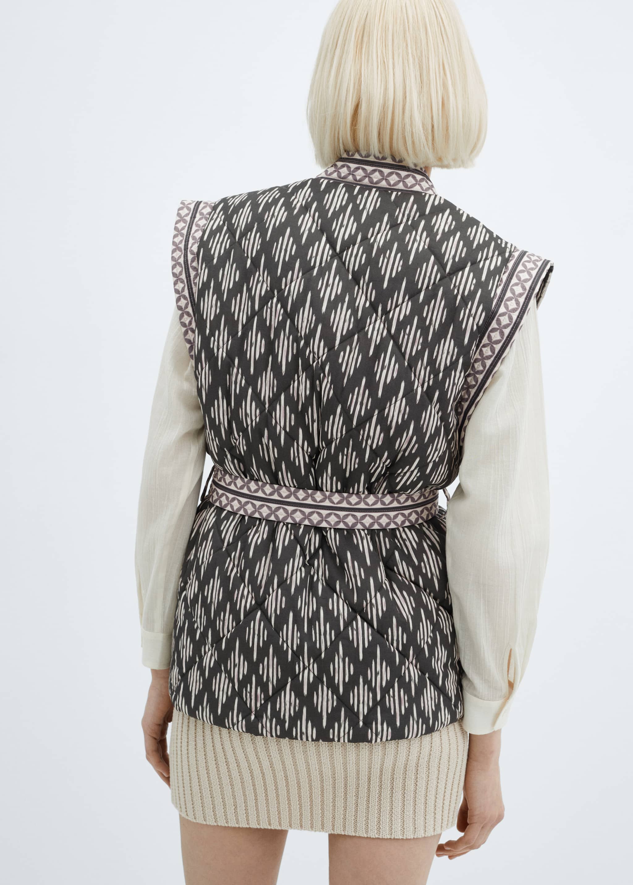 Quilted gilet with belt - Reverse of the article