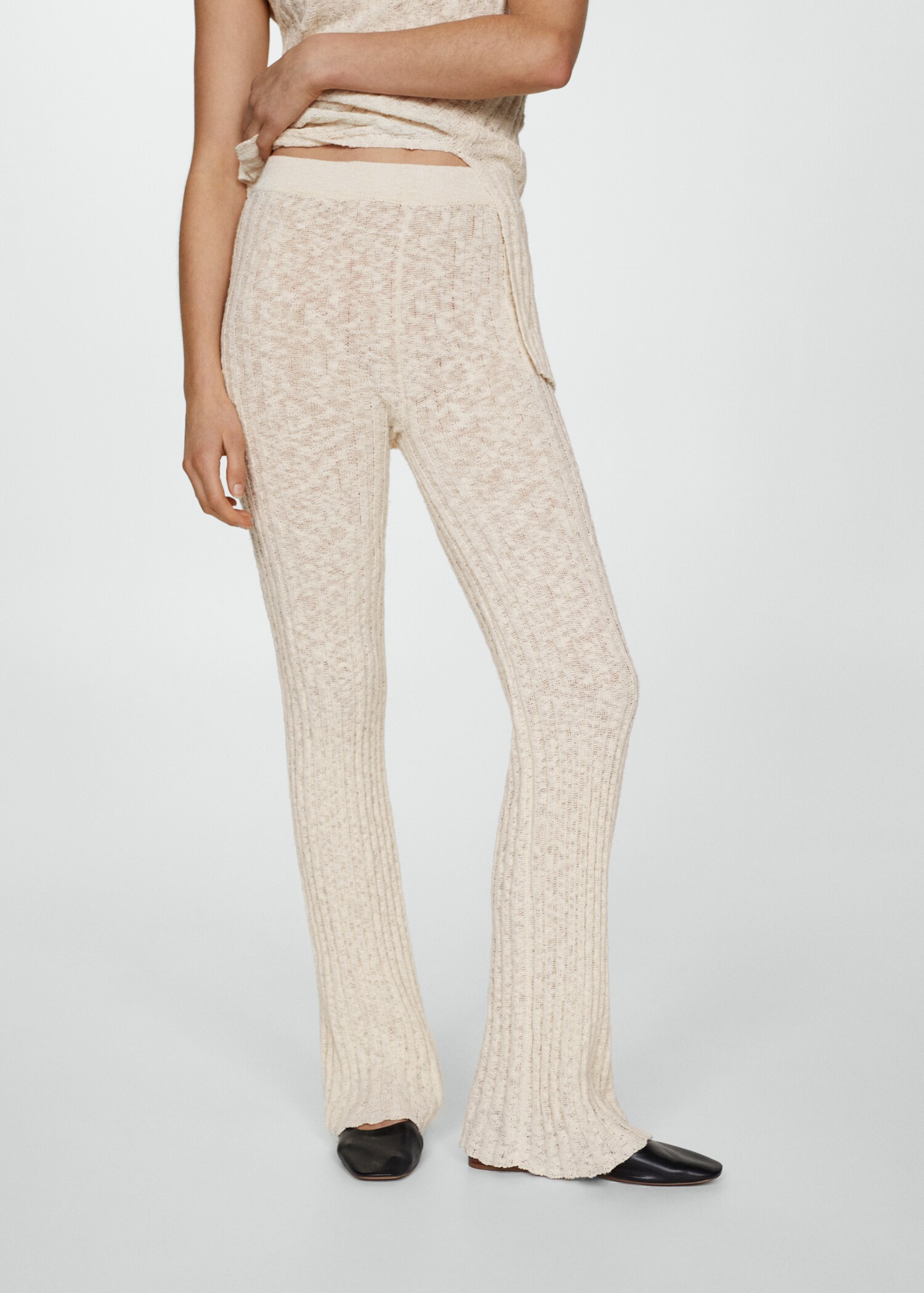 Flared ribbed knitted trousers - Medium plane