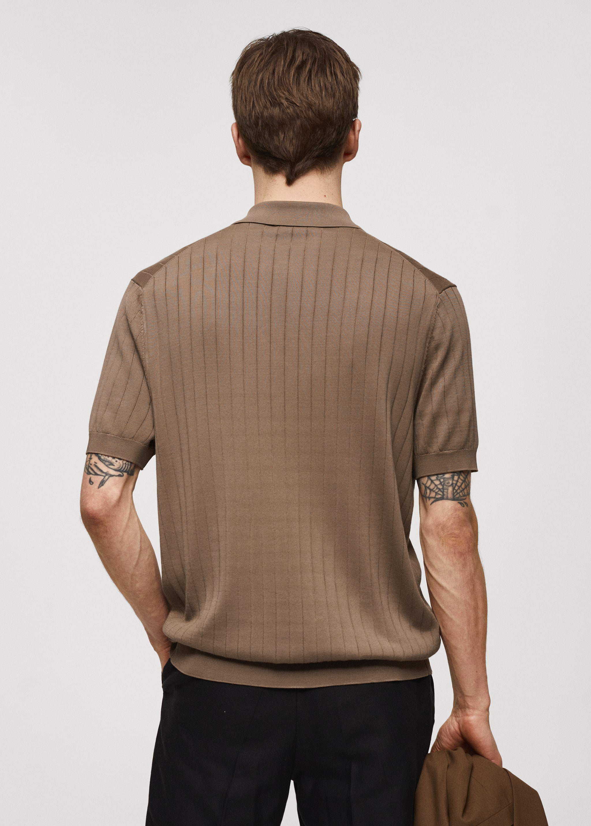 Knitted polo shirt with buttons - Reverse of the article