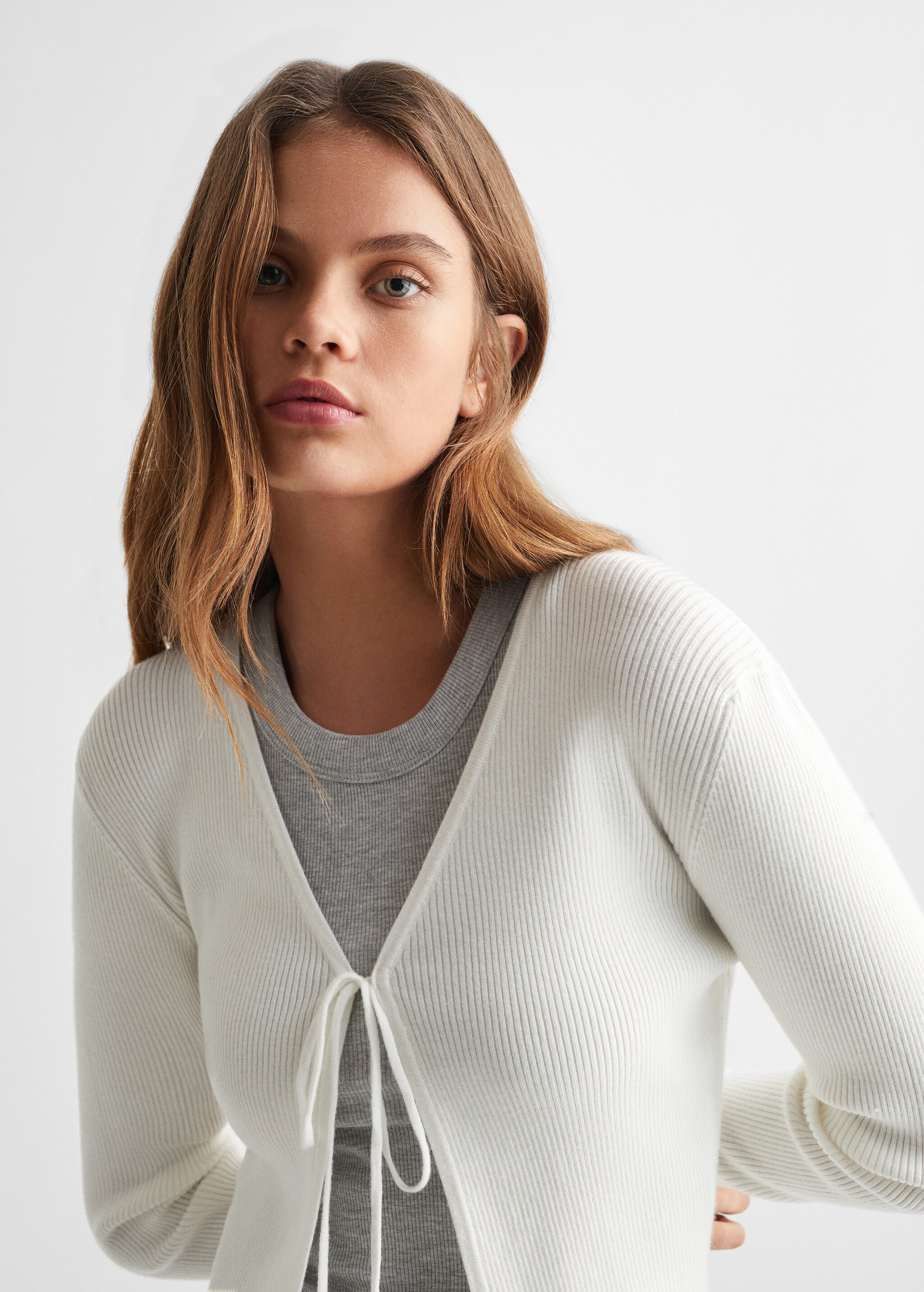 Knitted cardigan with bow - Details of the article 1