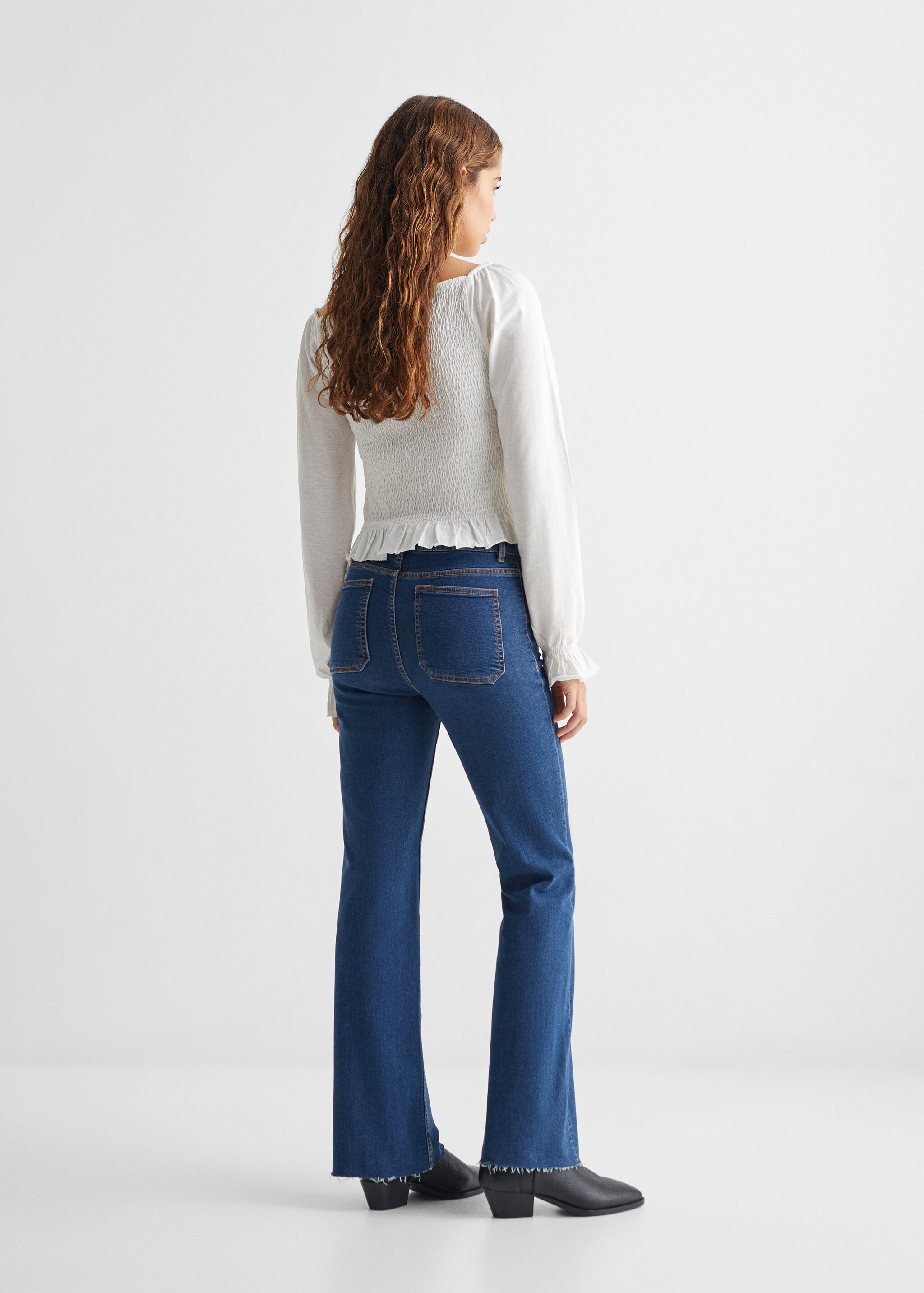Jeans flare bolsillos - Reverso del artículo