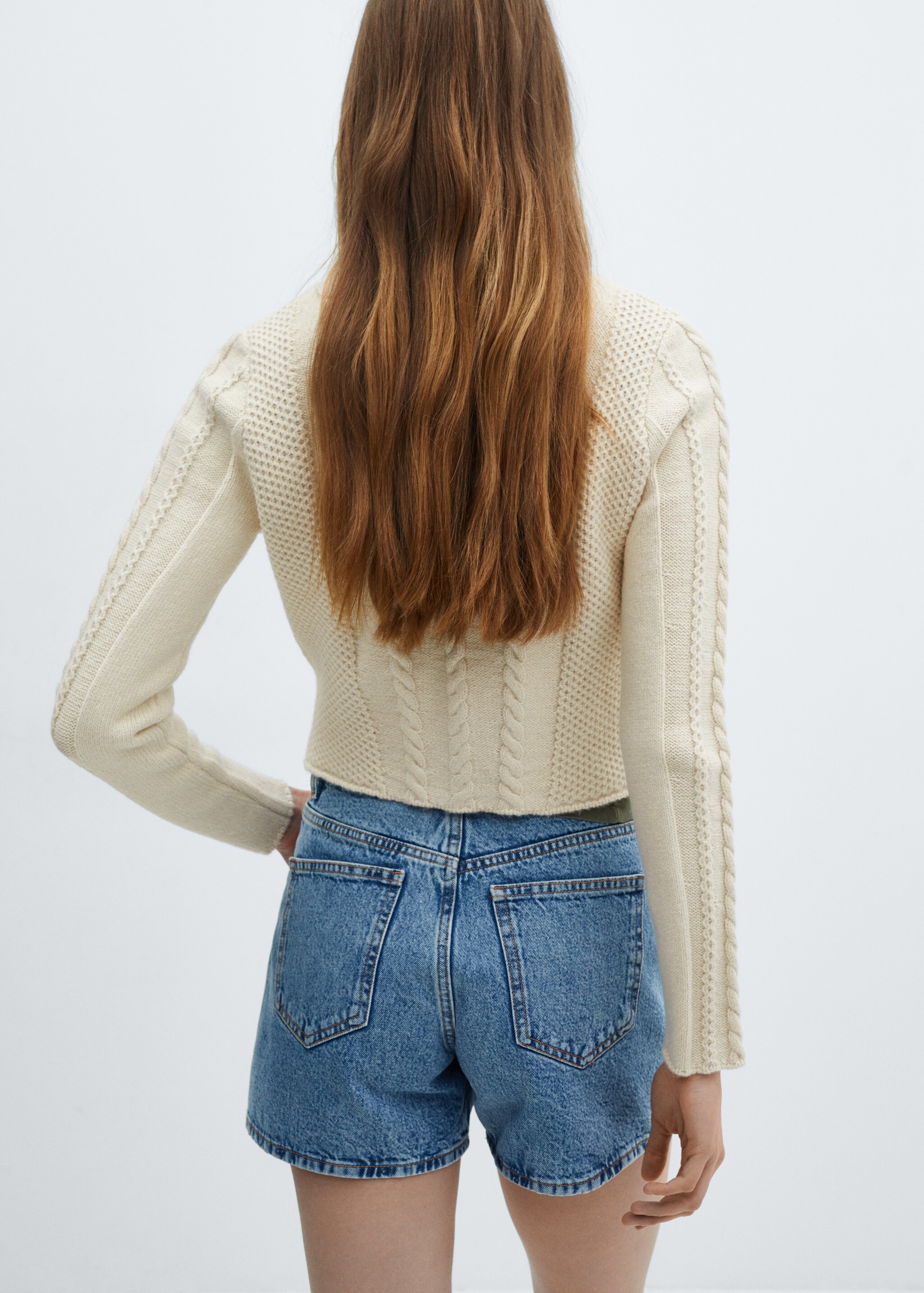 Buttoned knit braided cardigan - Reverse of the article