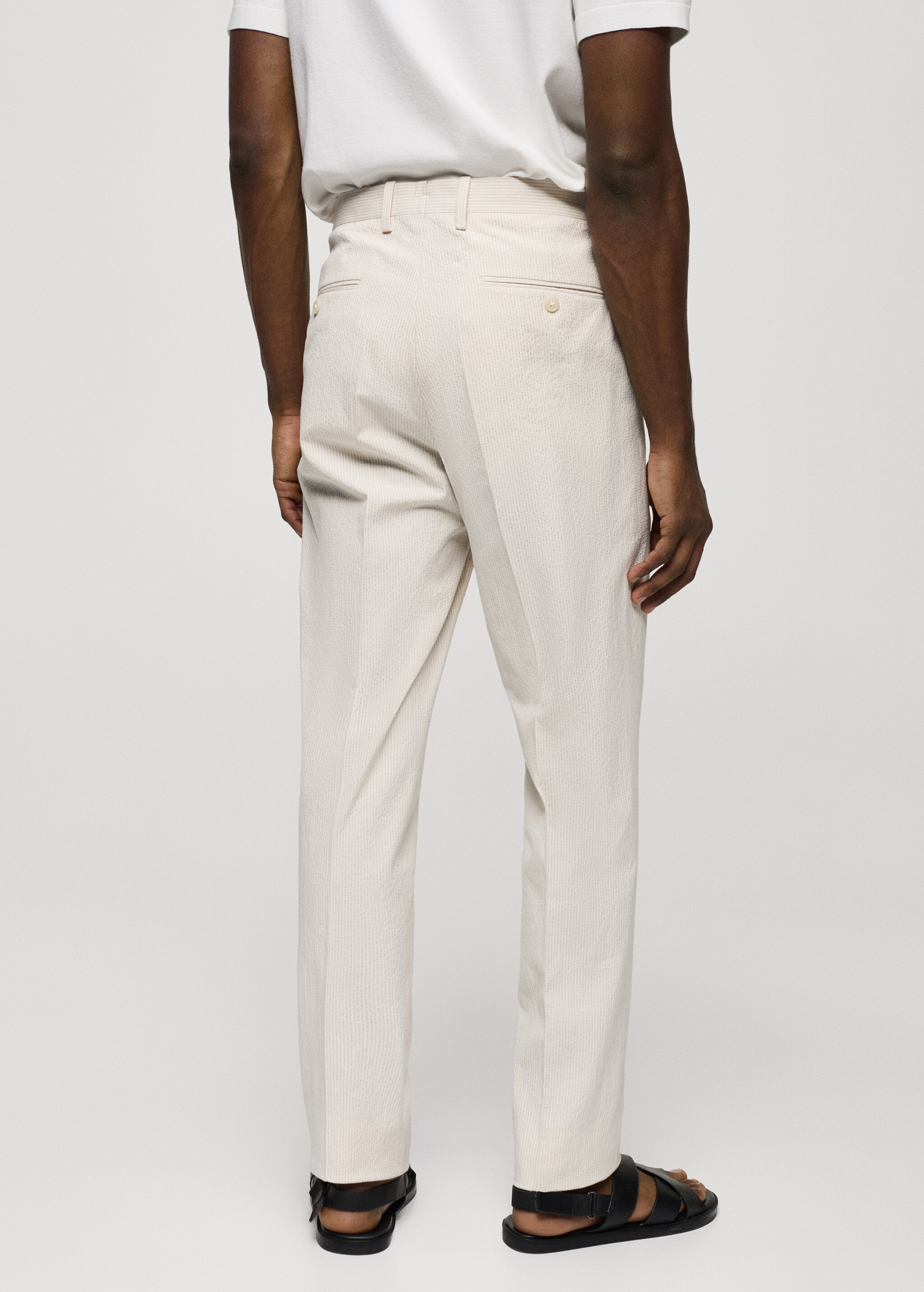 Костюмные брюки slim fit из хлопка сирсакер в полоску - Обратная сторона изделия