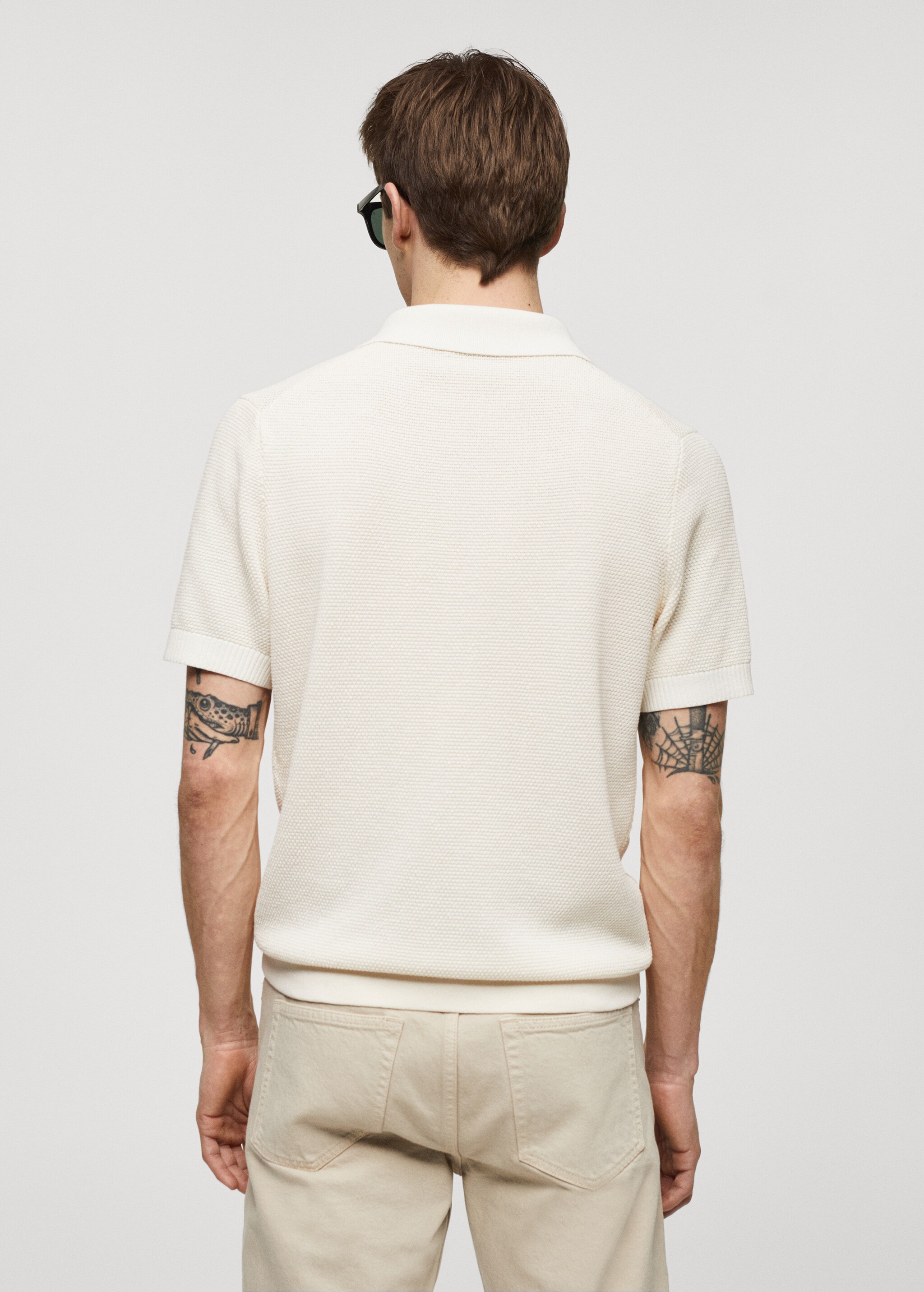 Structured knitted polo shirt - Reverse of the article