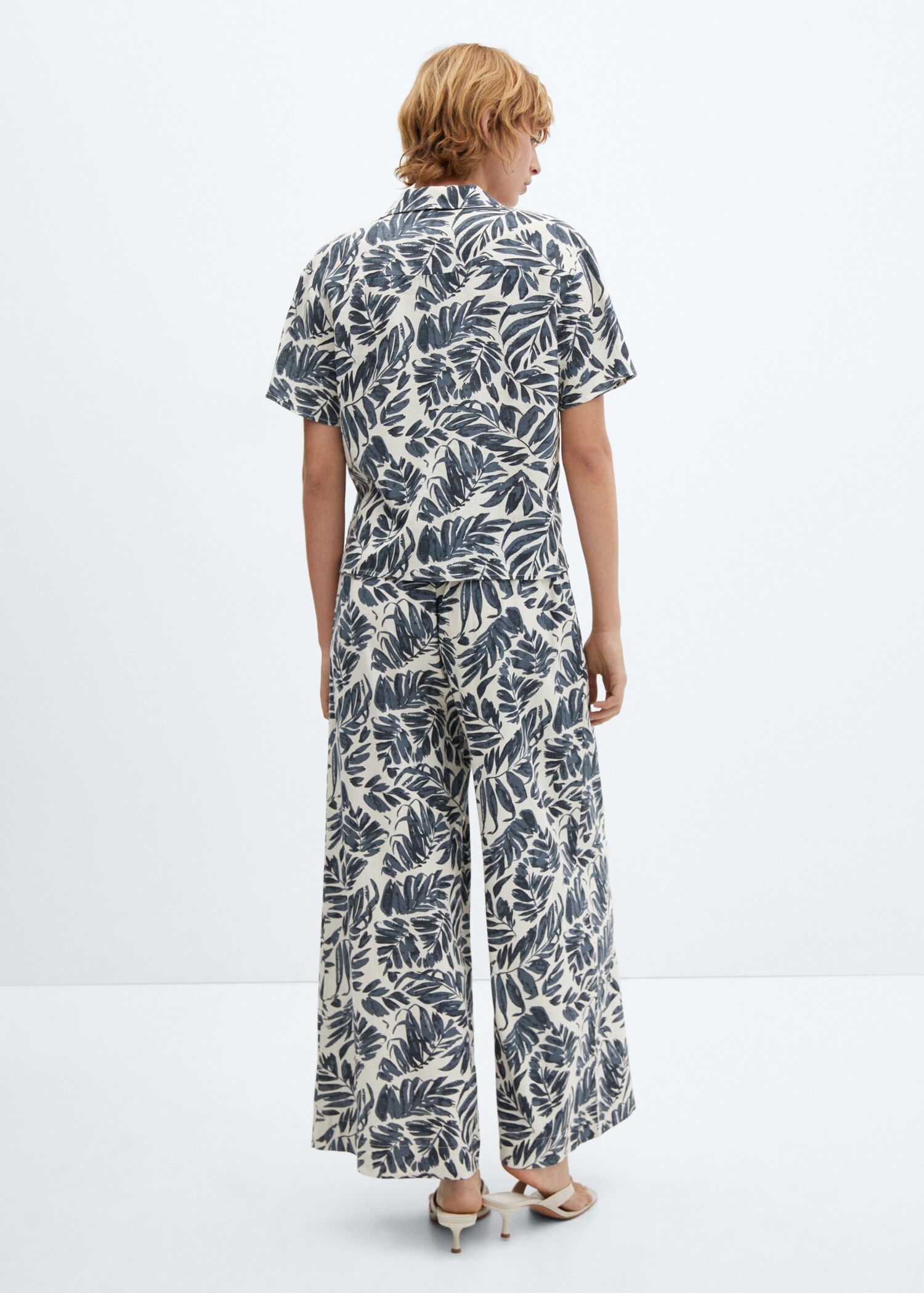 Tropical print linen pants - Reverse of the article