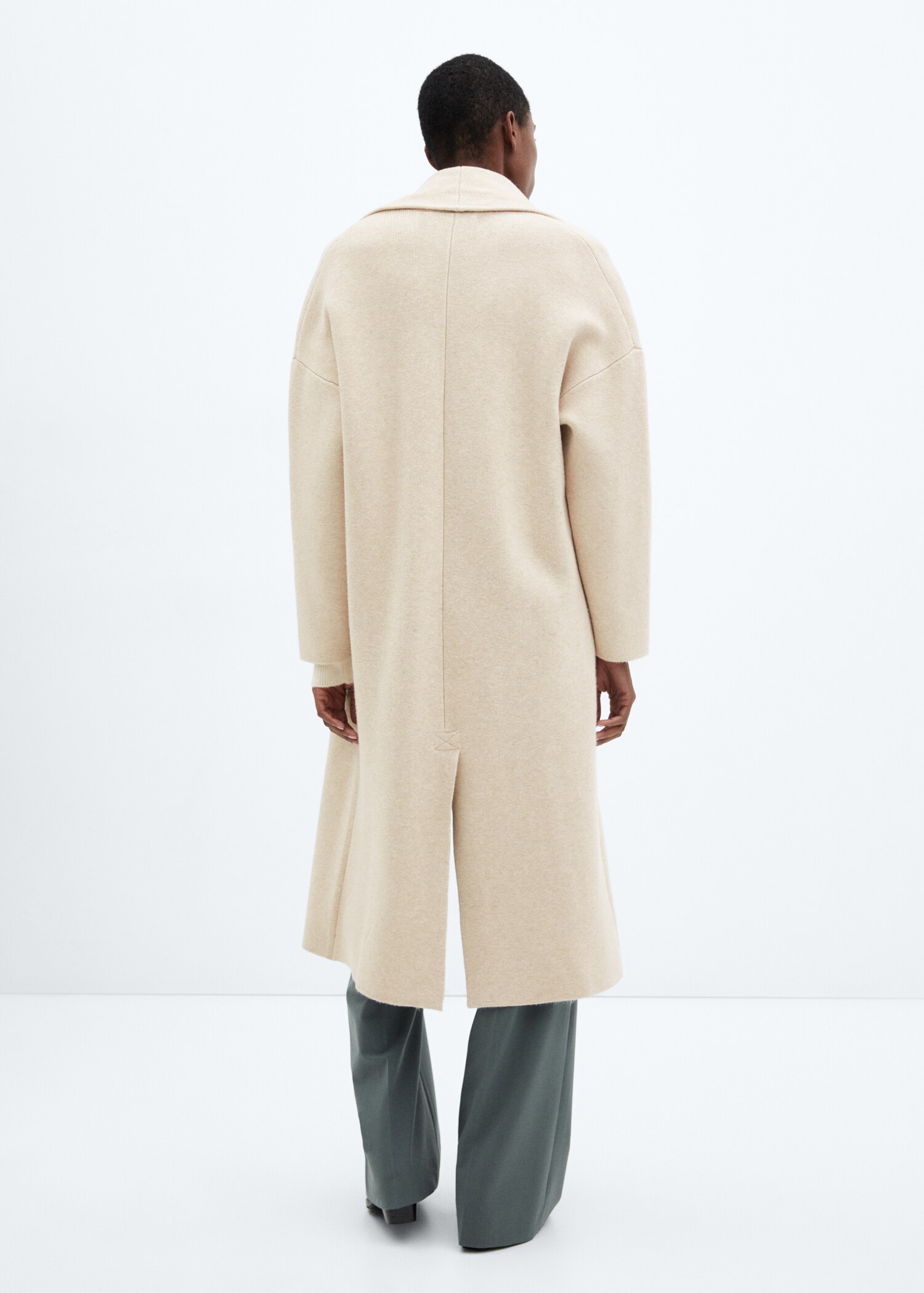 Oversized knitted coat with pockets - Reverse of the article