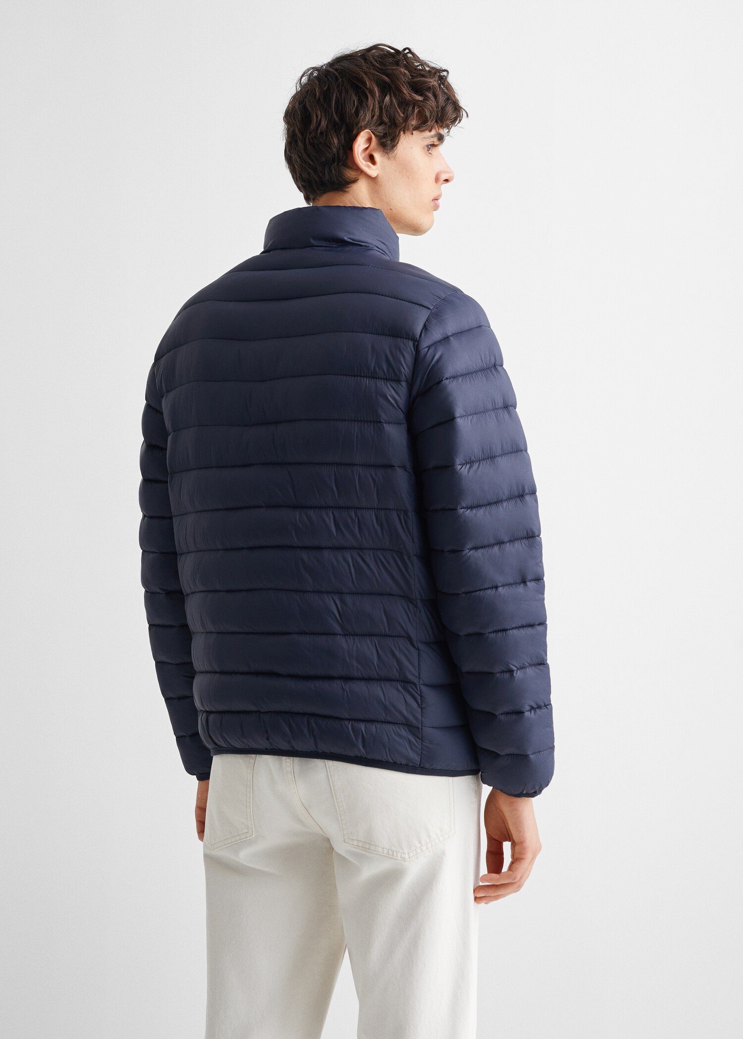 Side-zip quilted coat - Reverse of the article