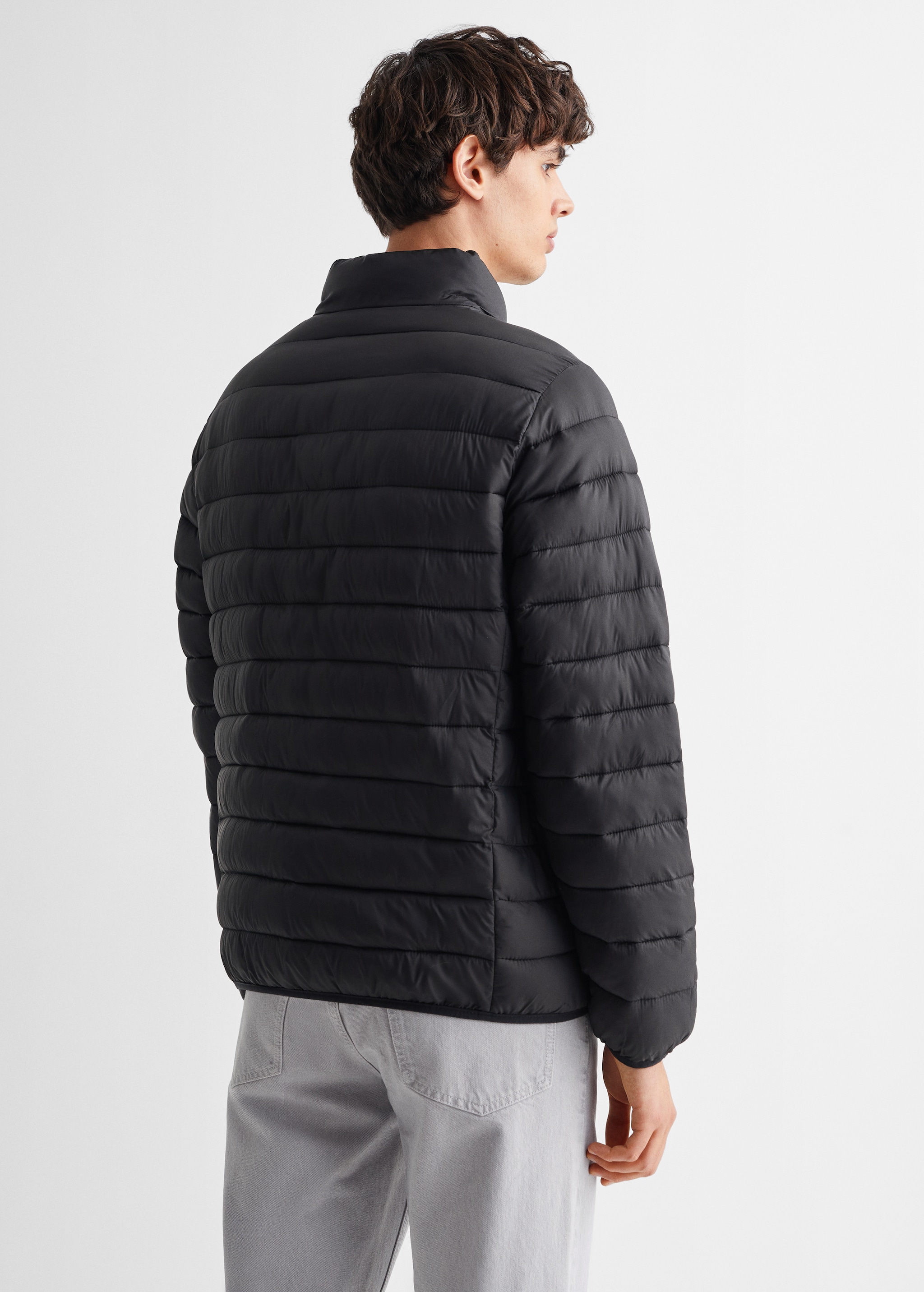 Side-zip quilted coat - Reverse of the article