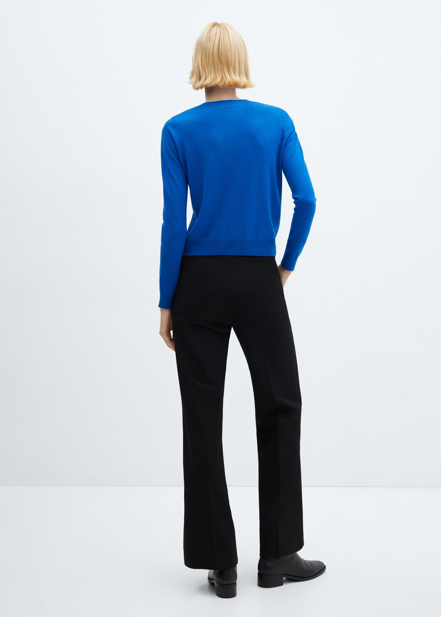 Round-neck knitted sweater - Reverse of the article
