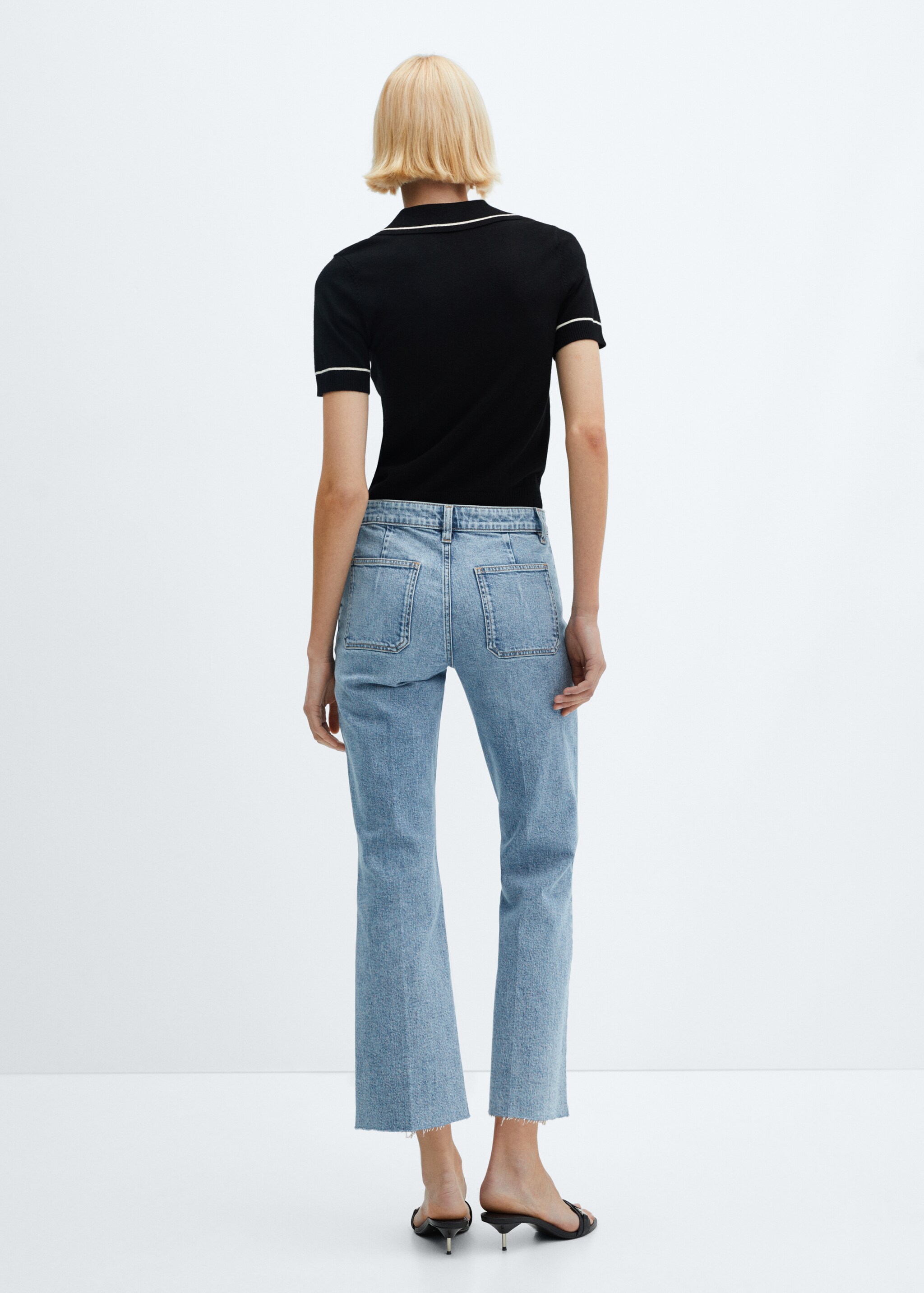 Flared jeans with pocket - Reverse of the article