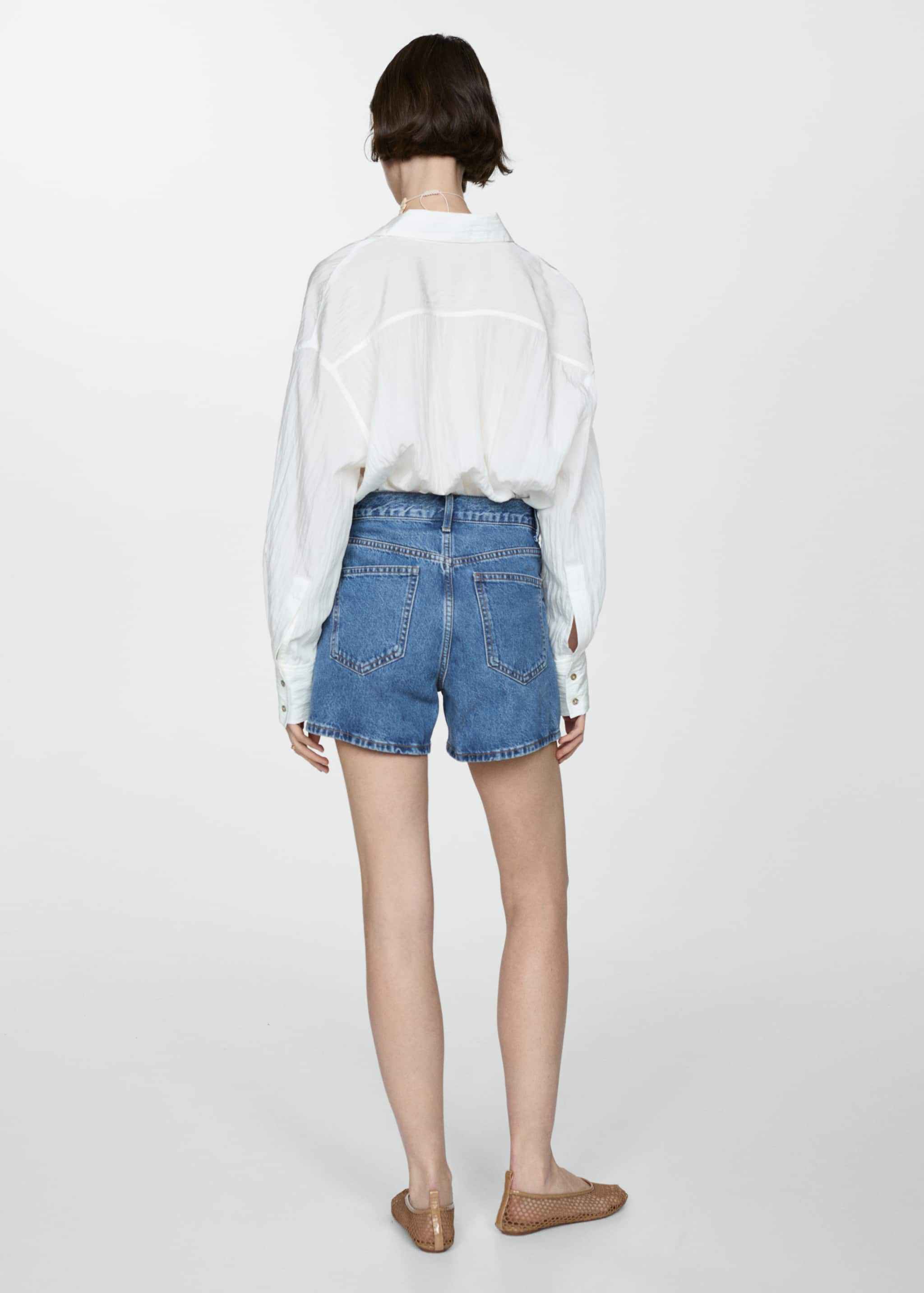 High-rise denim shorts - Reverse of the article