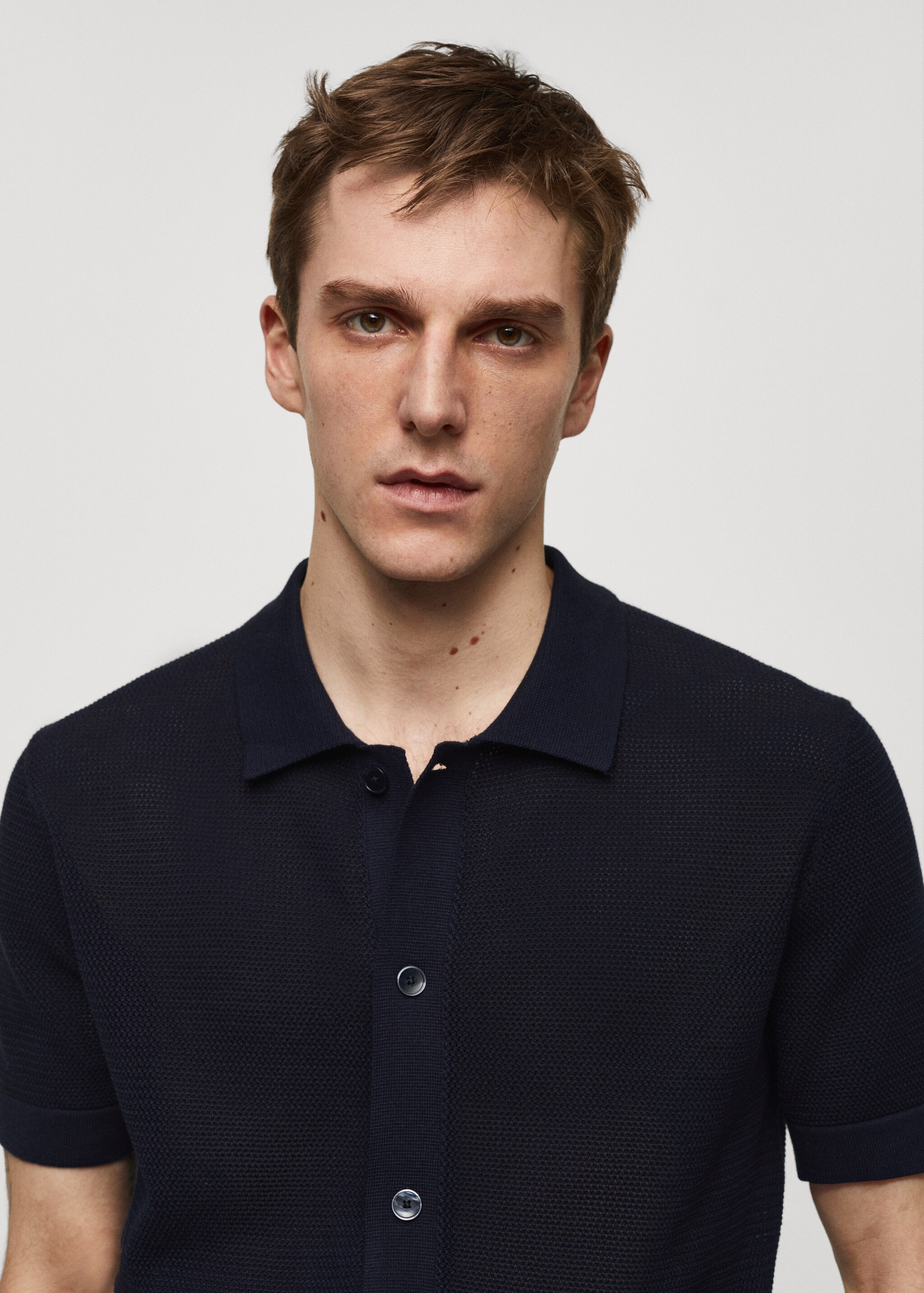Knitted polo shirt with buttons - Details of the article 1