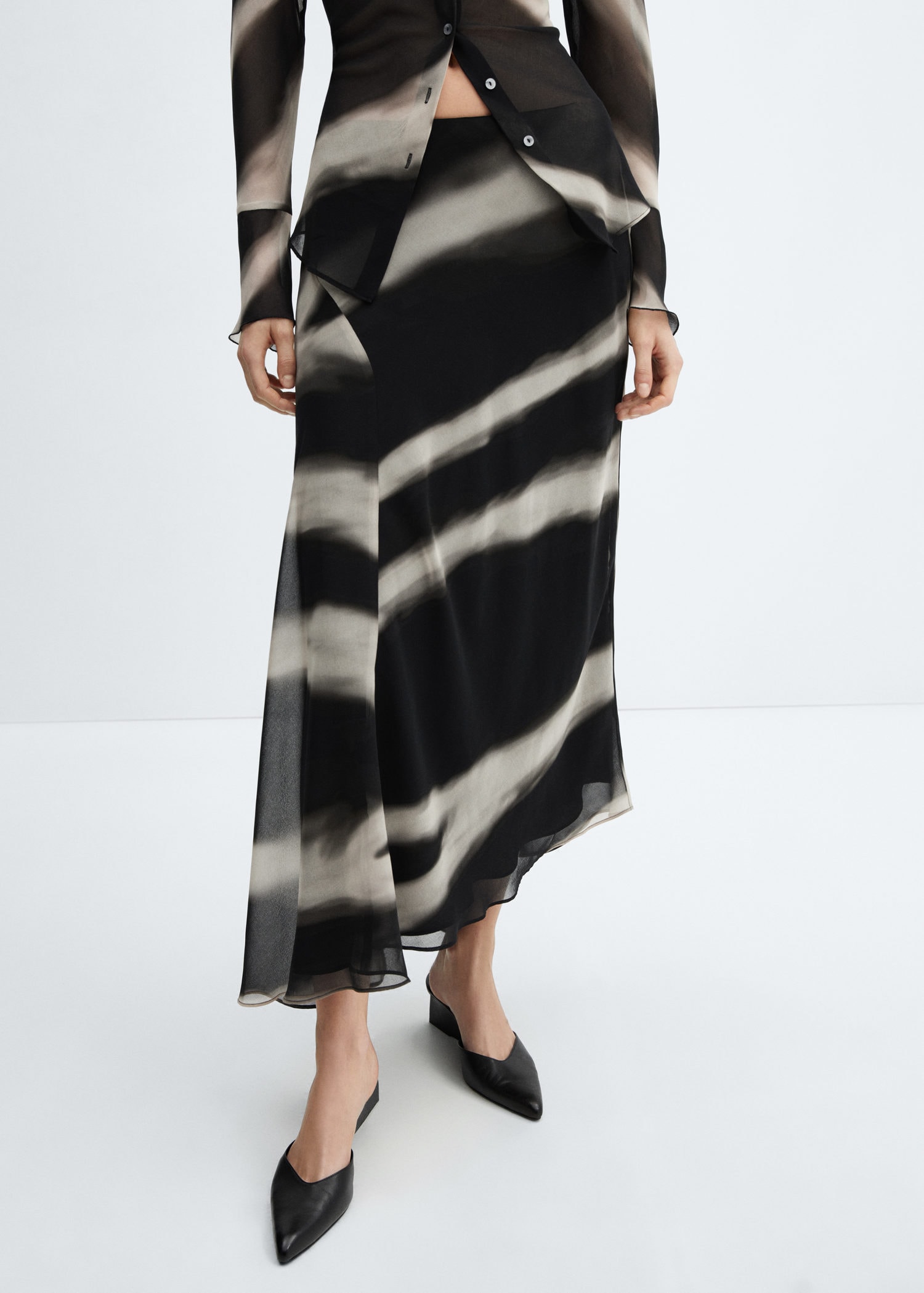Asymmetrical printed skirt | MANGO