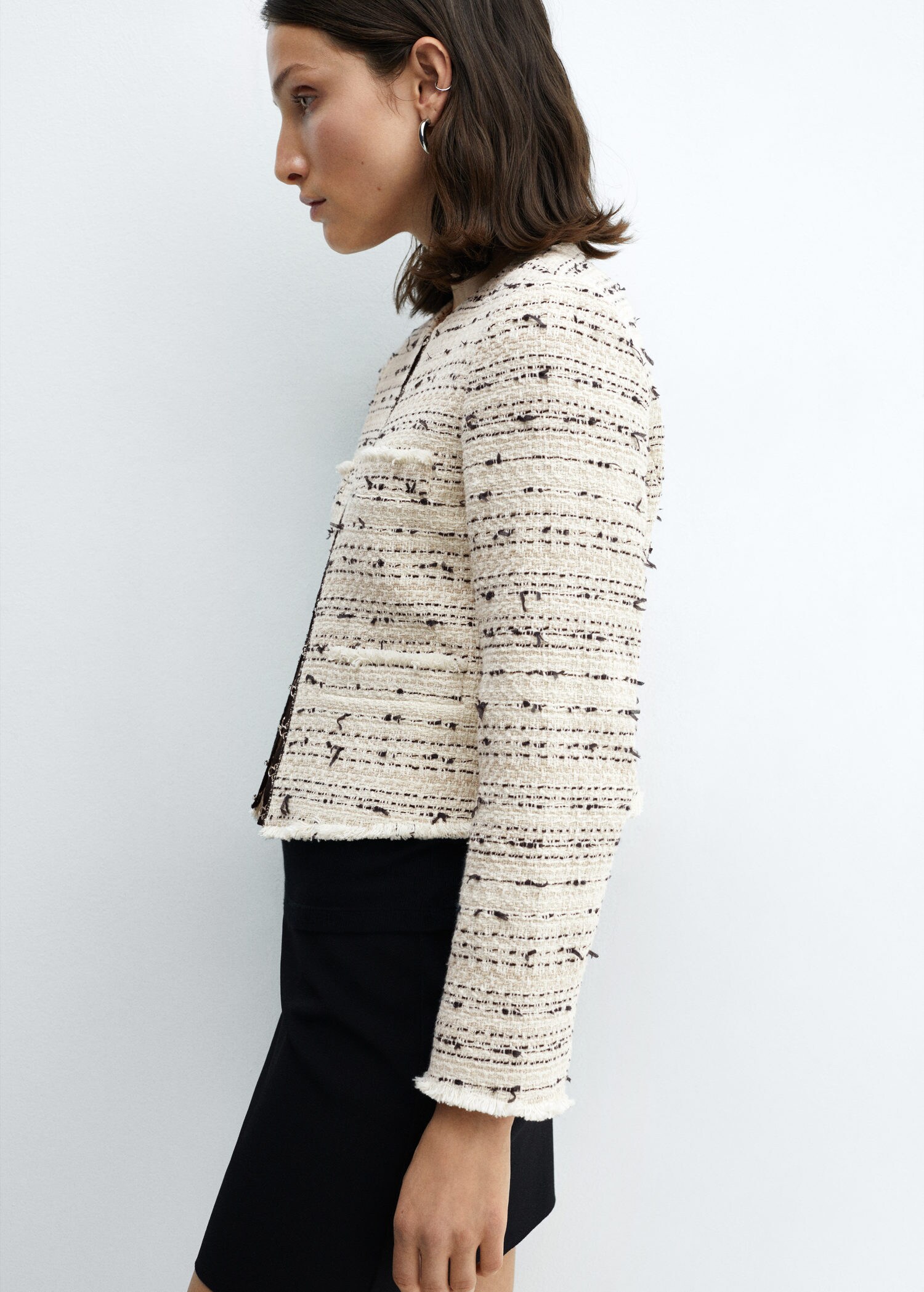 Tweed jacket with hook-and-eye fastenings