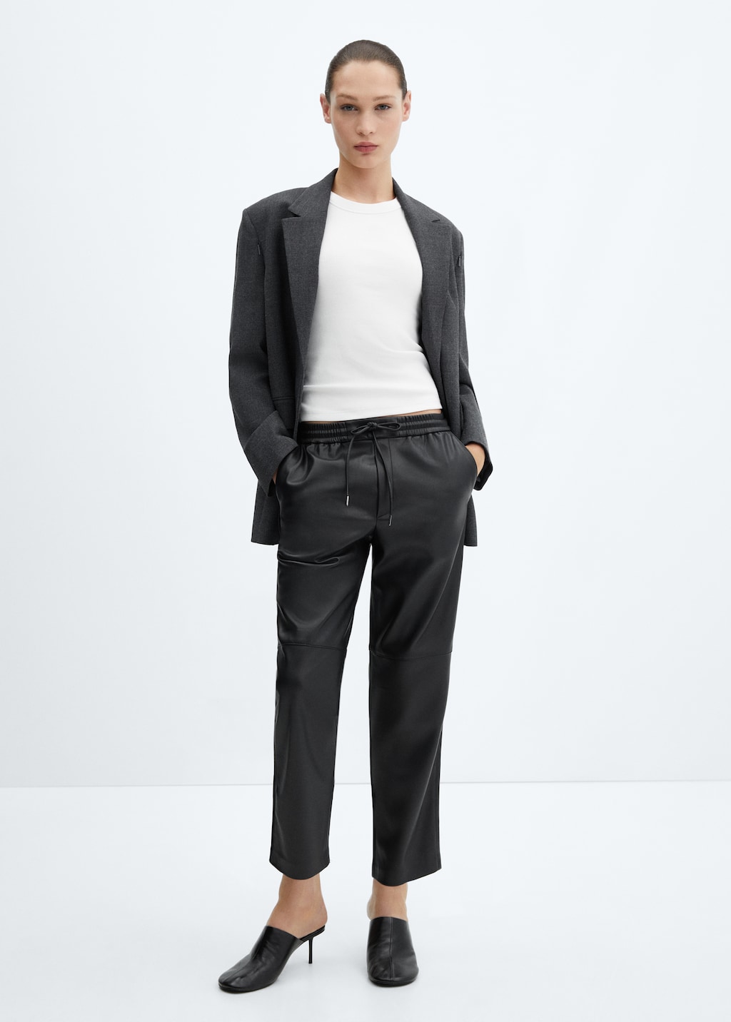 Leather-effect elastic waist trousers