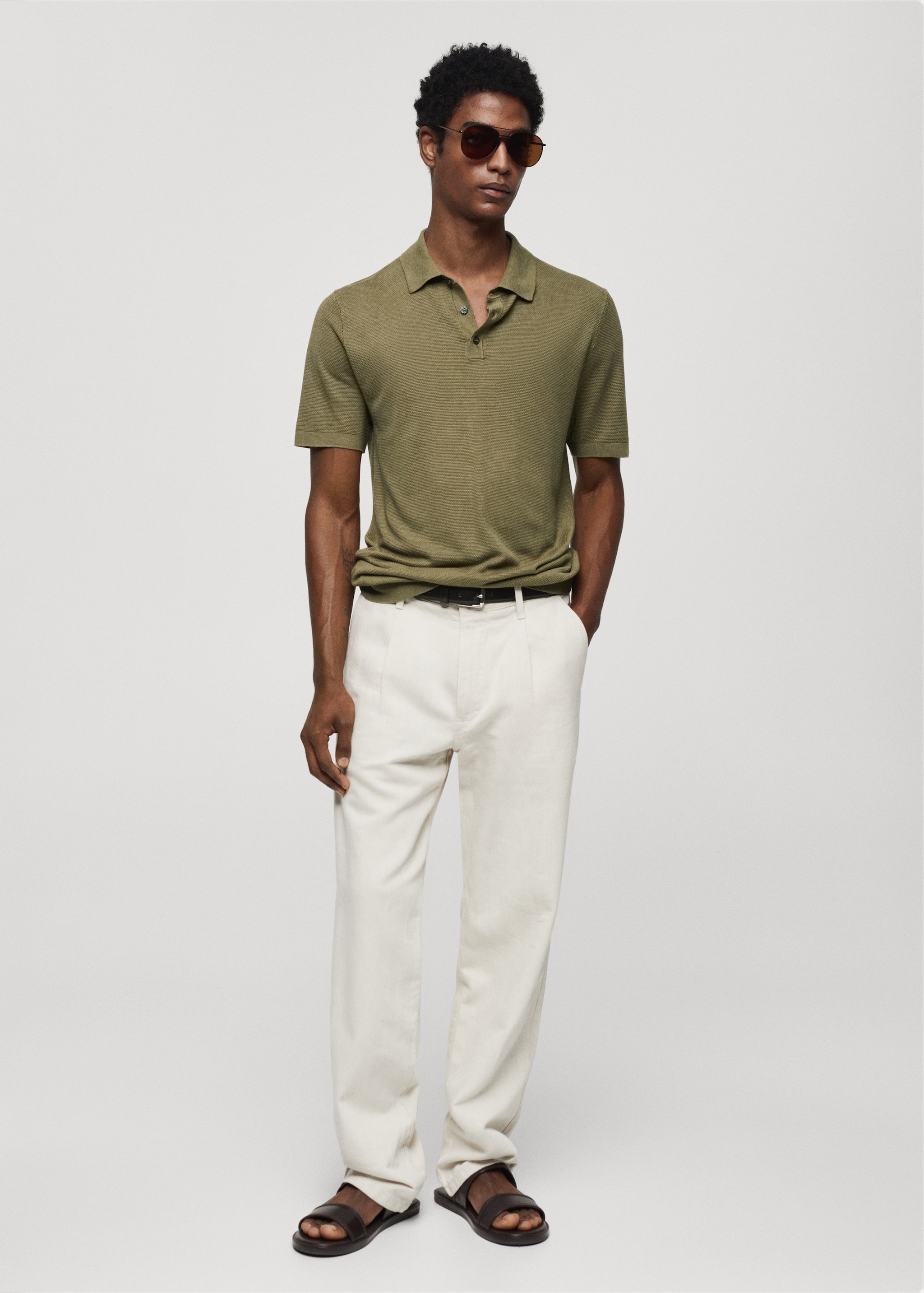 Buttoned micro-structure knitted polo shirt - General plane