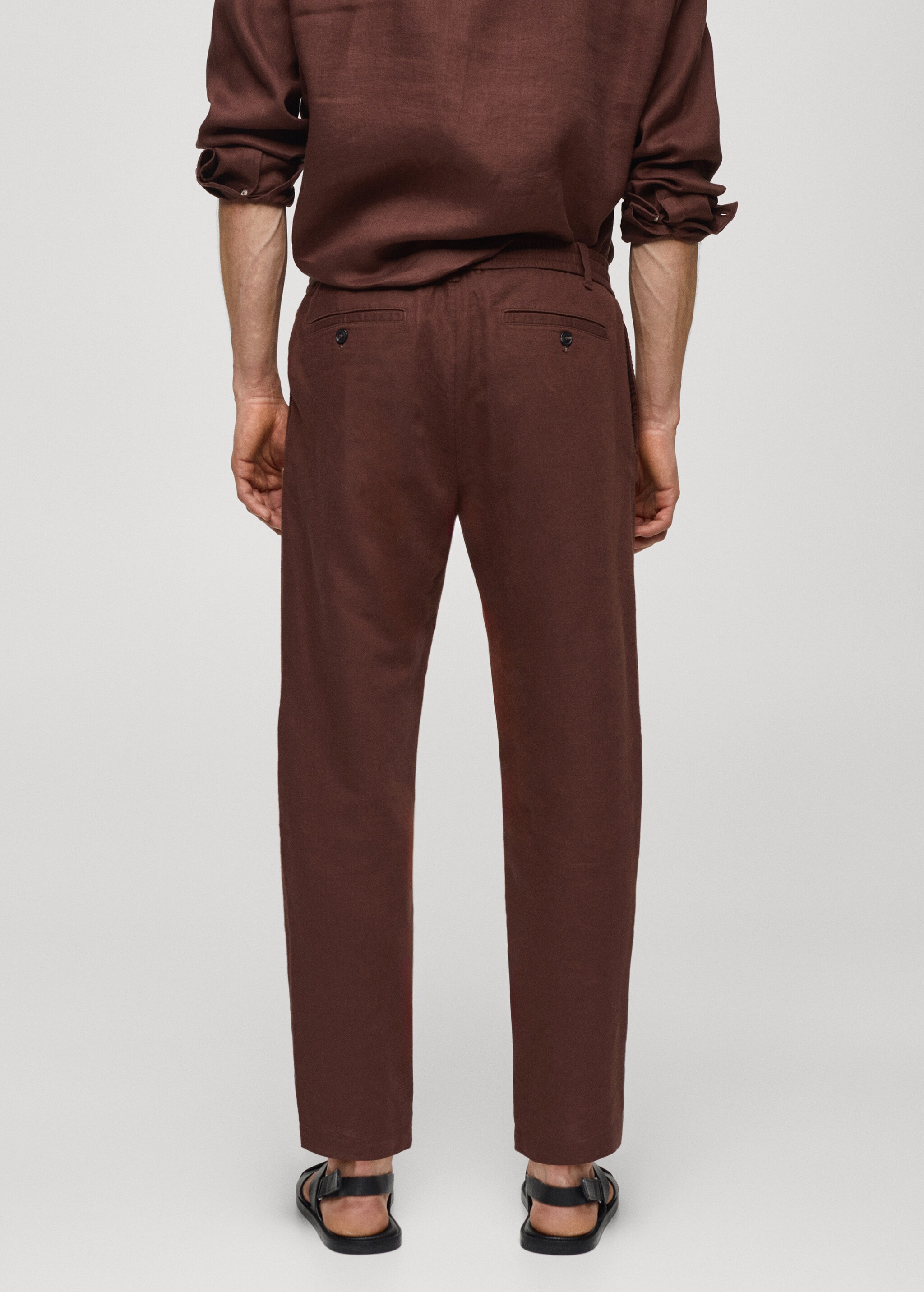 Slim-fit trousers with drawstring  - Reverse of the article