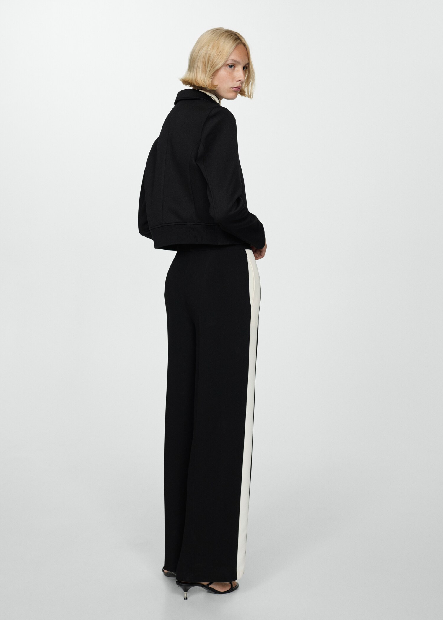 Striped trousers with contrasting sides - Reverse of the article