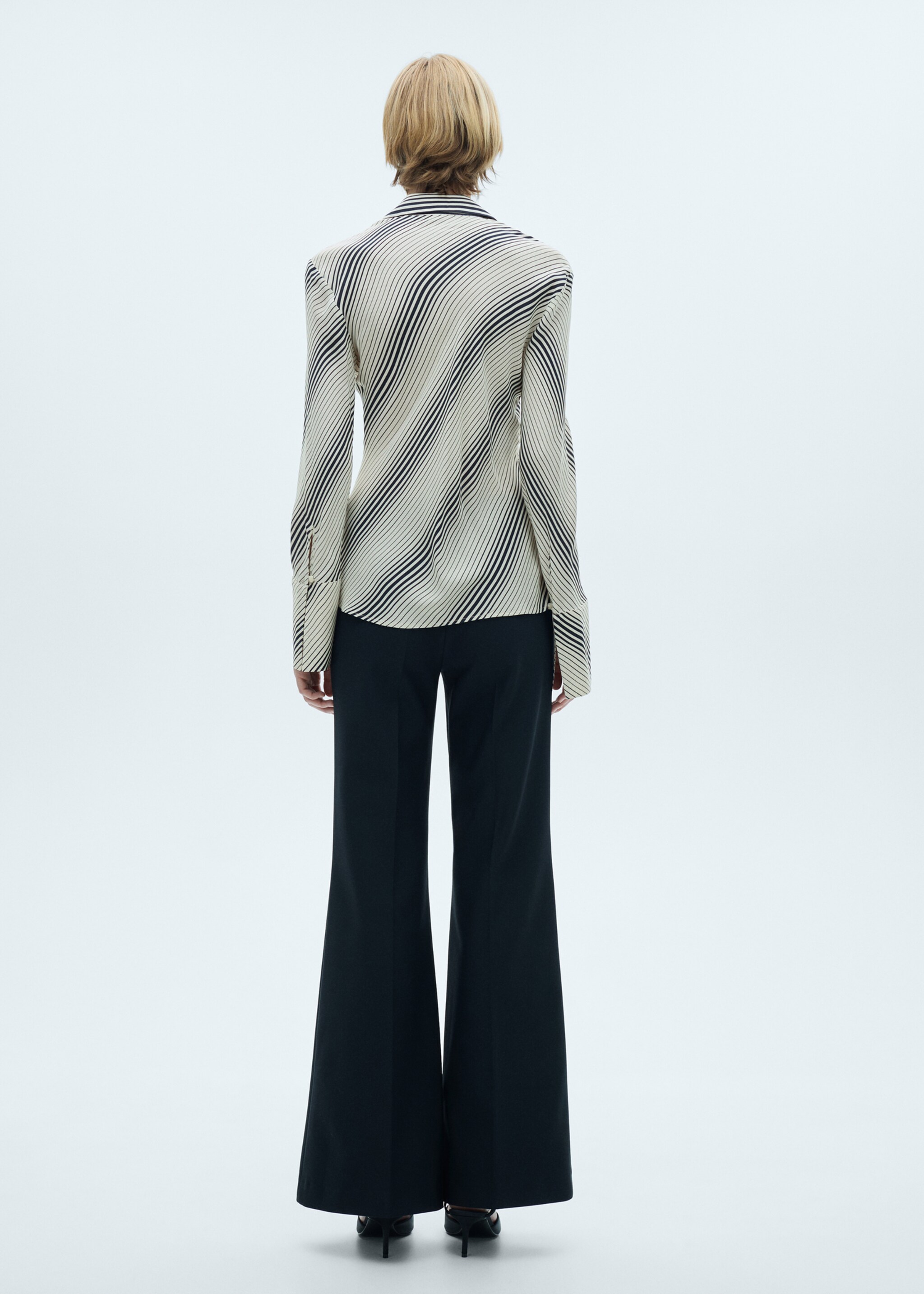 Striped shirt with flared sleeves - Reverse of the article