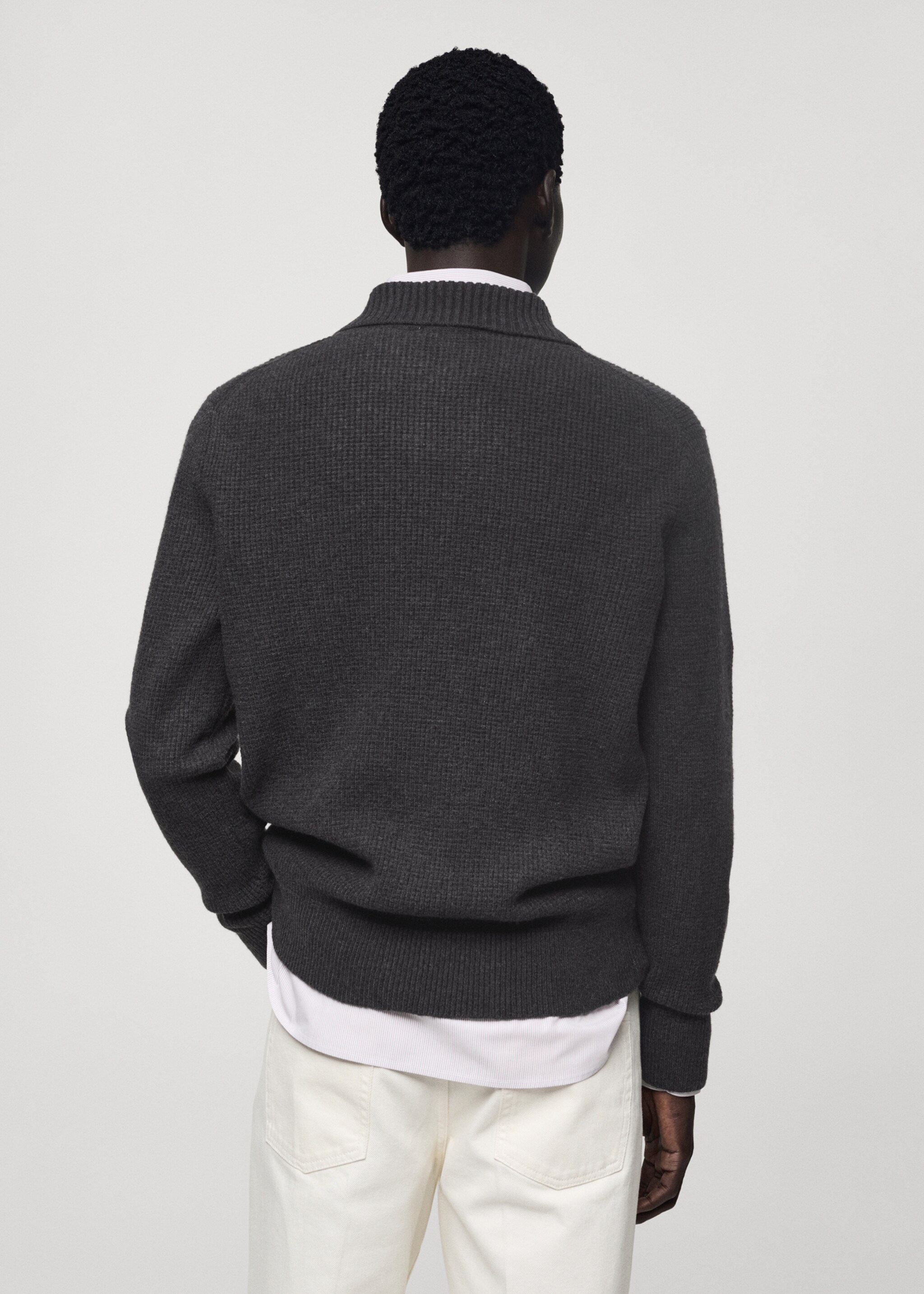 Knitted polo sweater with squared structure - Reverse of the article