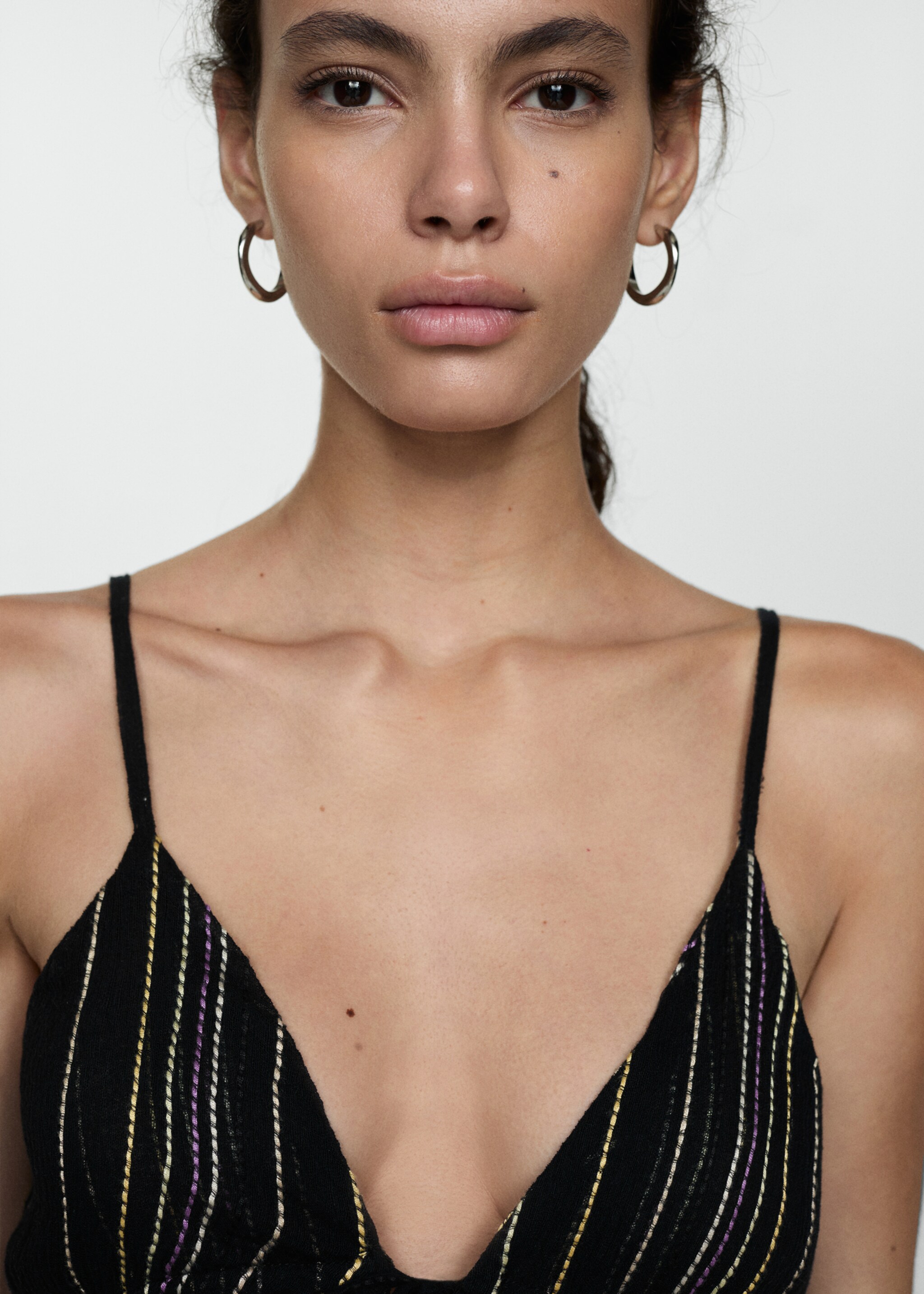 Strapless dress with decorative stitching - Details of the article 1, Black. Ref: 77010362-00.