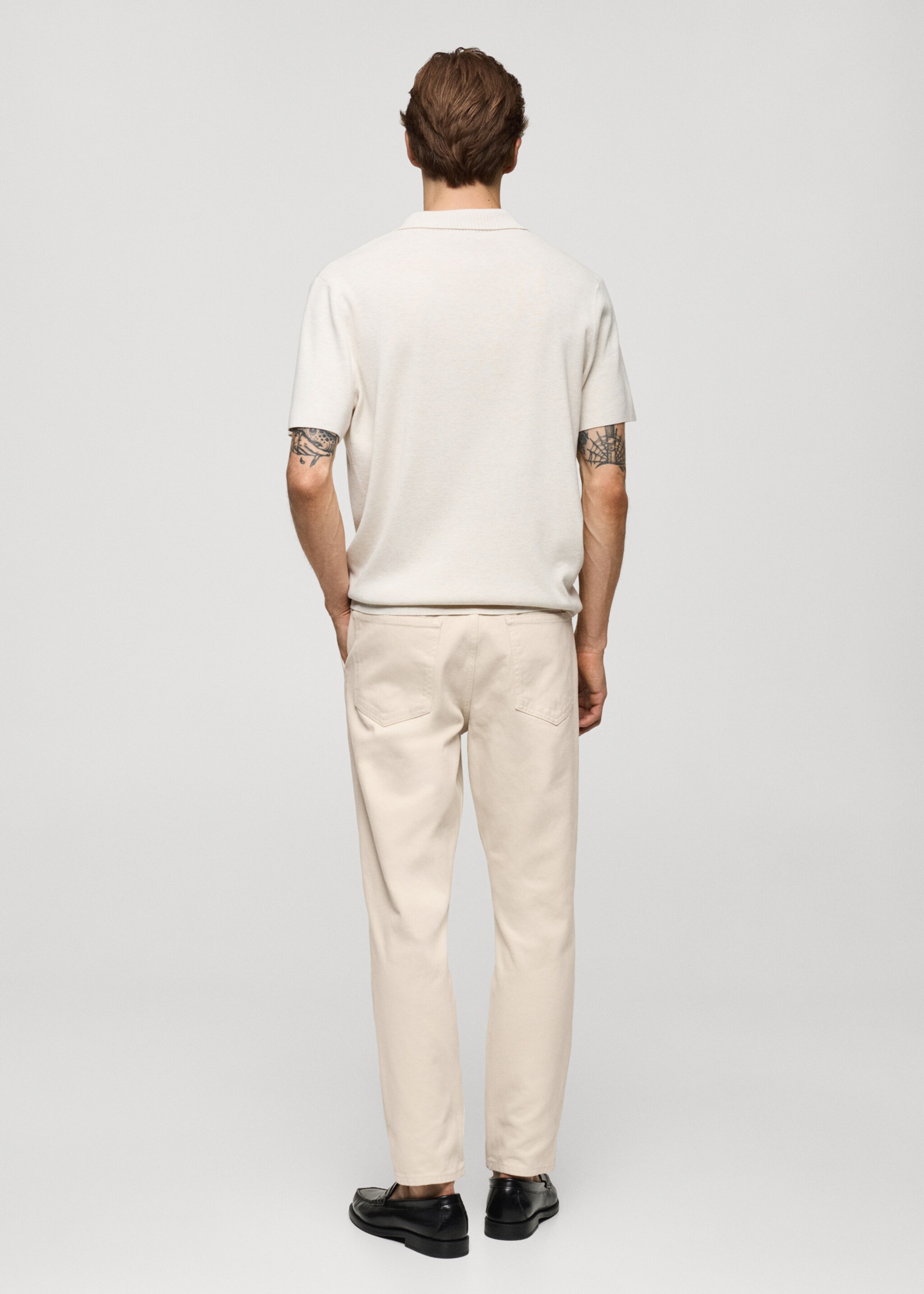 Tejano pinzas tapered fit - Reverso del artículo